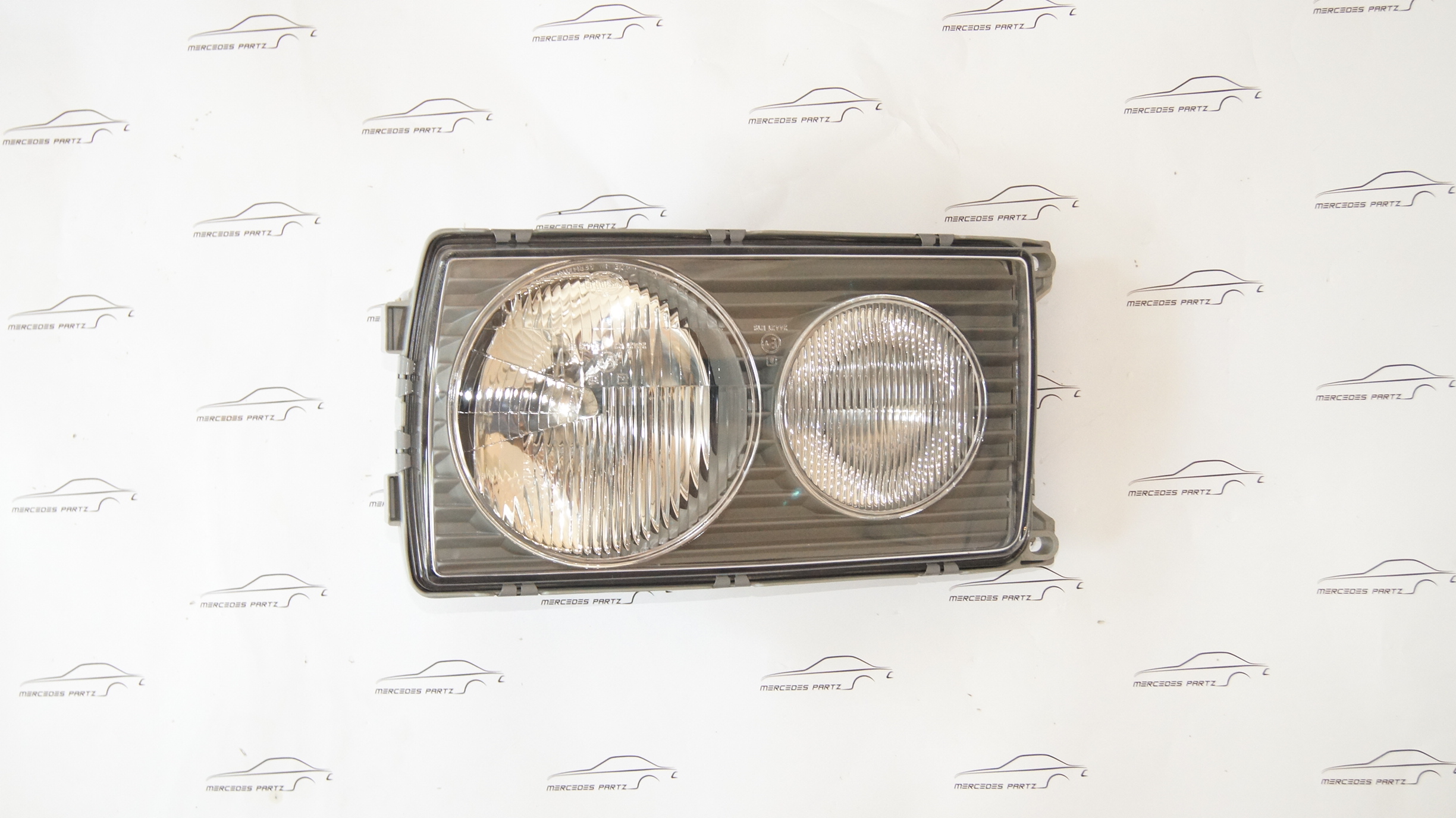 W123 Left Hella headlight Genuine Mercedes Part W123 Left Hella headlight Genuine Mercedes Part