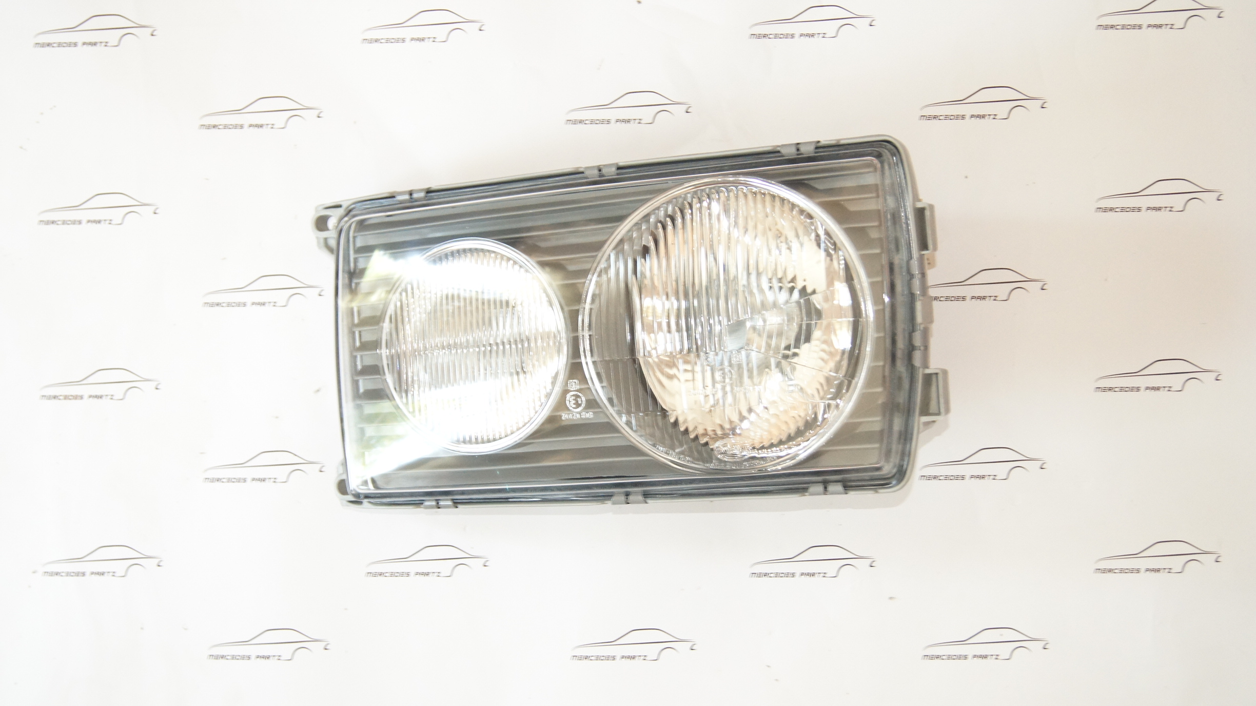 W123 Left Hella headlight Genuine Mercedes Part W123 Left Hella headlight Genuine Mercedes Part