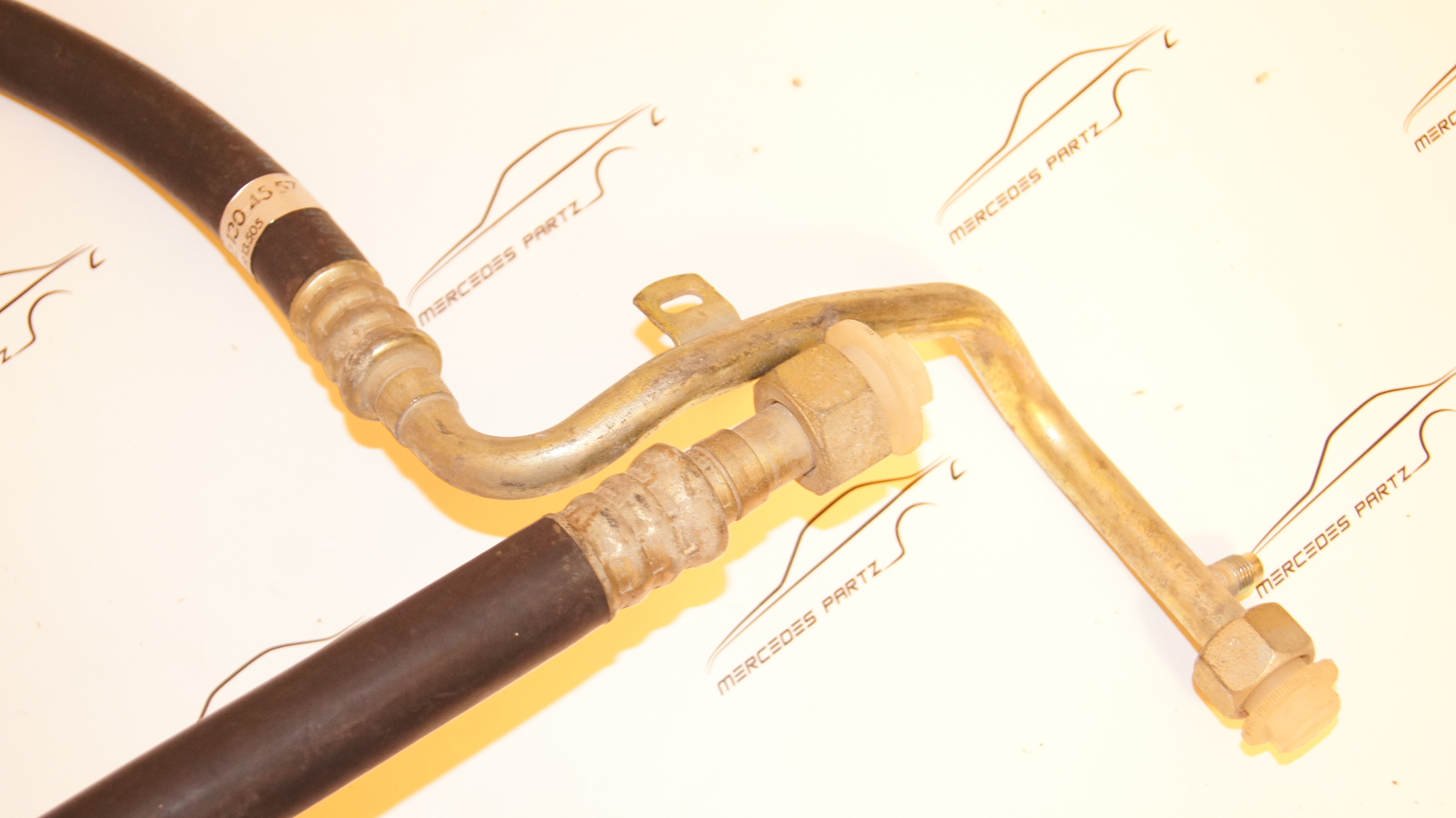 M102 suction pipe refrigerant line with damper cage Genuine Mercedes Part M102 suction pipe refrigerant line with damper cage Genuine Mercedes Part