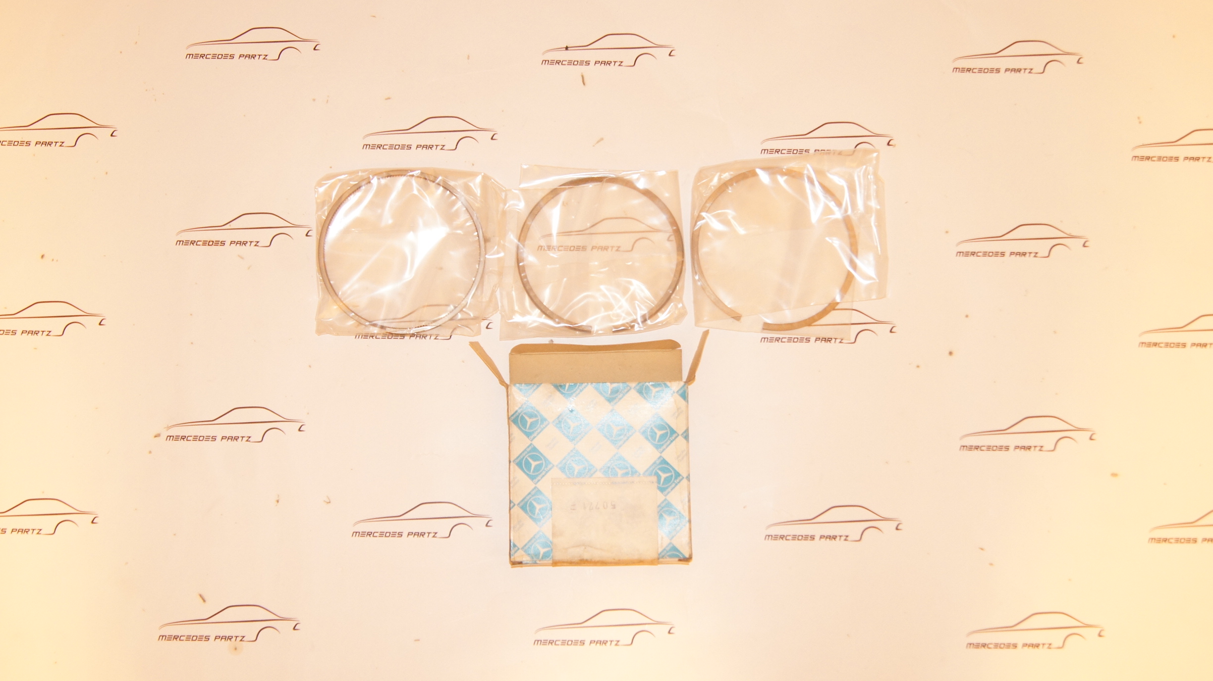 A0010303024 W116 450SEL 6.9 M100 100.985 standard 107.00mm piston ring set of 8 Genuine Mercedes Part A0010303024 W116 450SEL 6.9 M100 100.985 standard 107.00mm piston ring set of 8 Genuine Mercedes Part