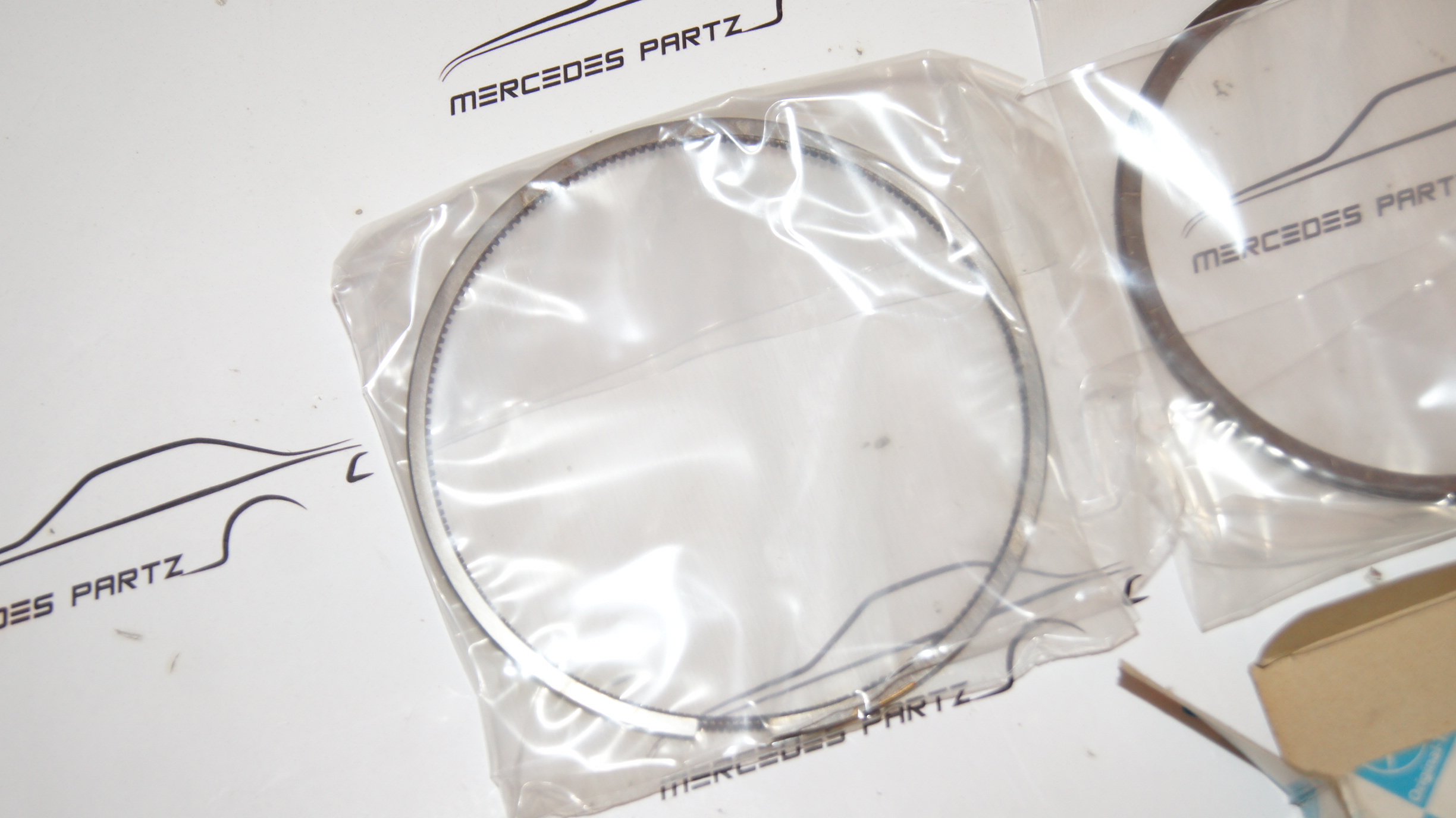 A0010303024 W116 450SEL 6.9 M100 100.985 standard 107.00mm piston ring set of 8 Genuine Mercedes Part A0010303024 W116 450SEL 6.9 M100 100.985 standard 107.00mm piston ring set of 8 Genuine Mercedes Part