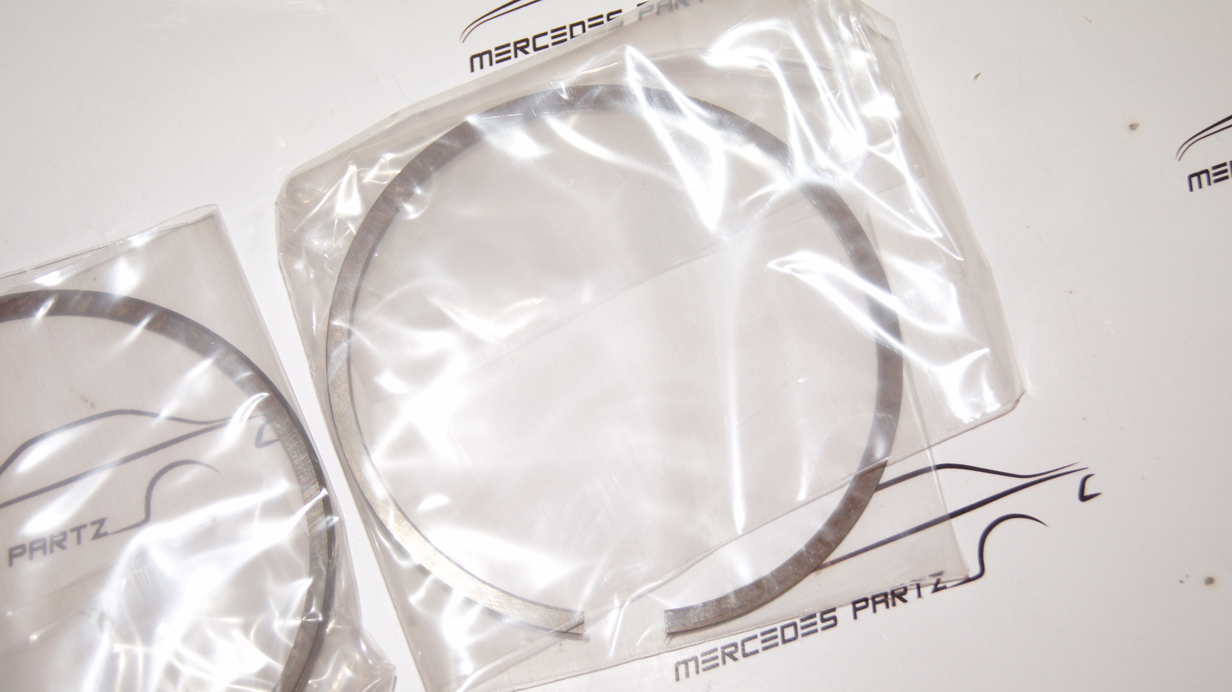 A0010303024 W116 450SEL 6.9 M100 100.985 standard 107.00mm piston ring set of 8 Genuine Mercedes Part A0010303024 W116 450SEL 6.9 M100 100.985 standard 107.00mm piston ring set of 8 Genuine Mercedes Part