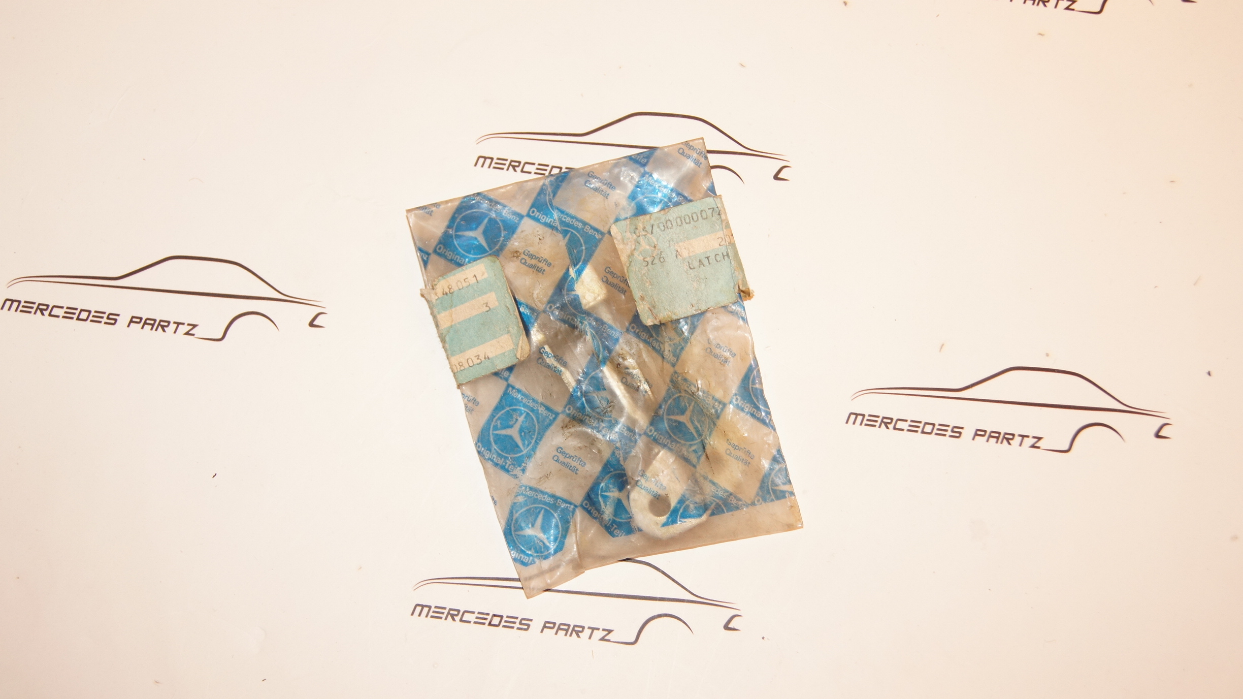 W201 hood hinge lever Genuine Mercedes Part W201 hood hinge lever Genuine Mercedes Part