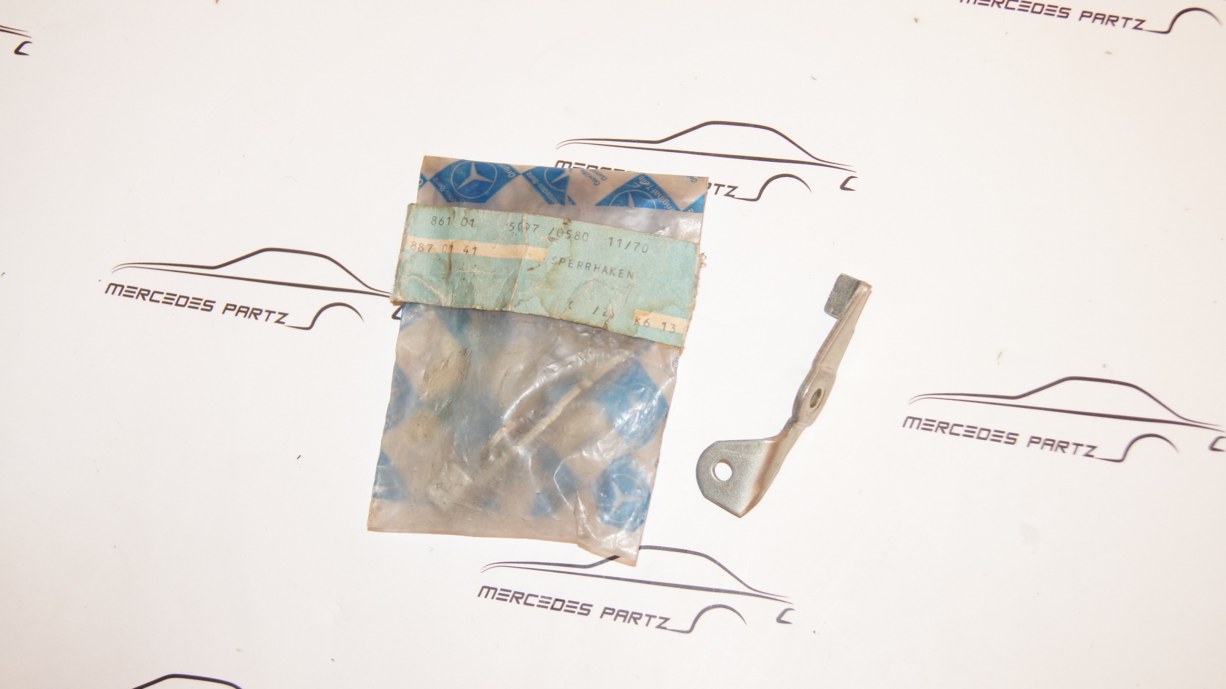 W201 hood hinge lever Genuine Mercedes Part W201 hood hinge lever Genuine Mercedes Part