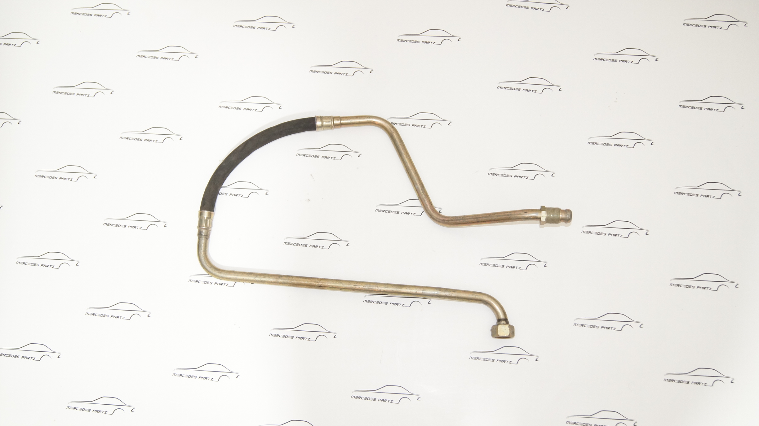 M110 oil cooler to oil filter hose A1101871482 Genuine Mercedes Part M110 oil cooler to oil filter hose A1101871482 Genuine Mercedes Part