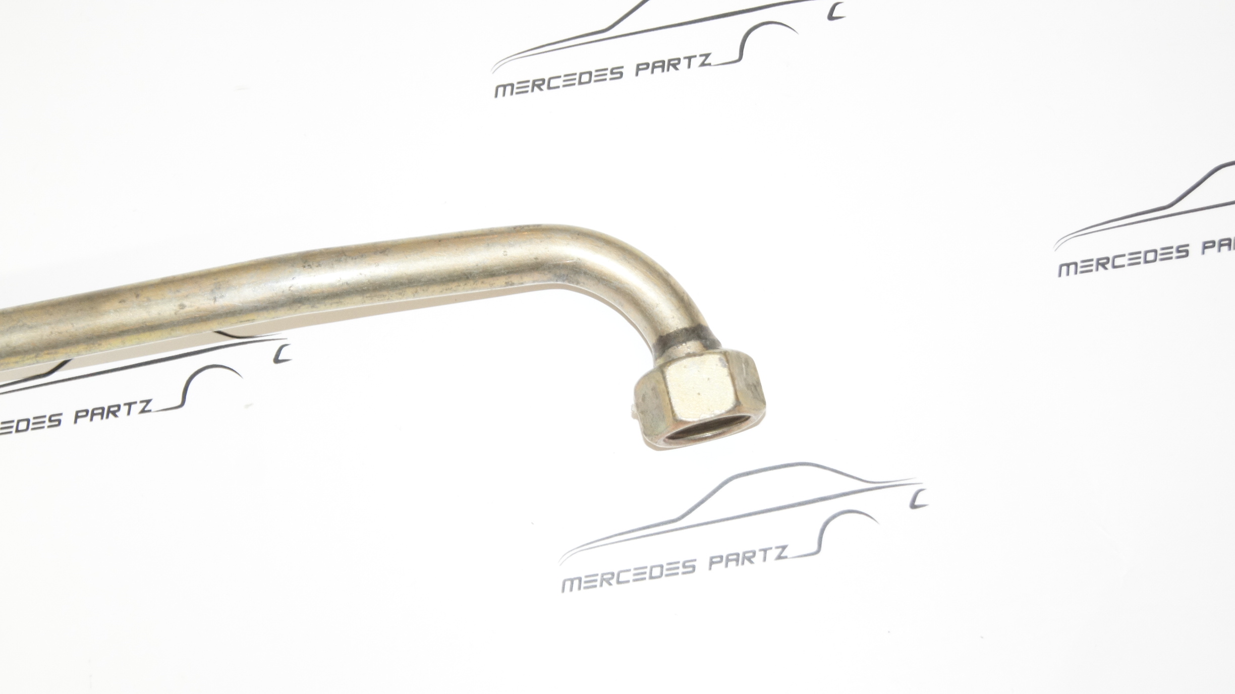 M110 oil cooler to oil filter hose A1101871482 Genuine Mercedes Part M110 oil cooler to oil filter hose A1101871482 Genuine Mercedes Part