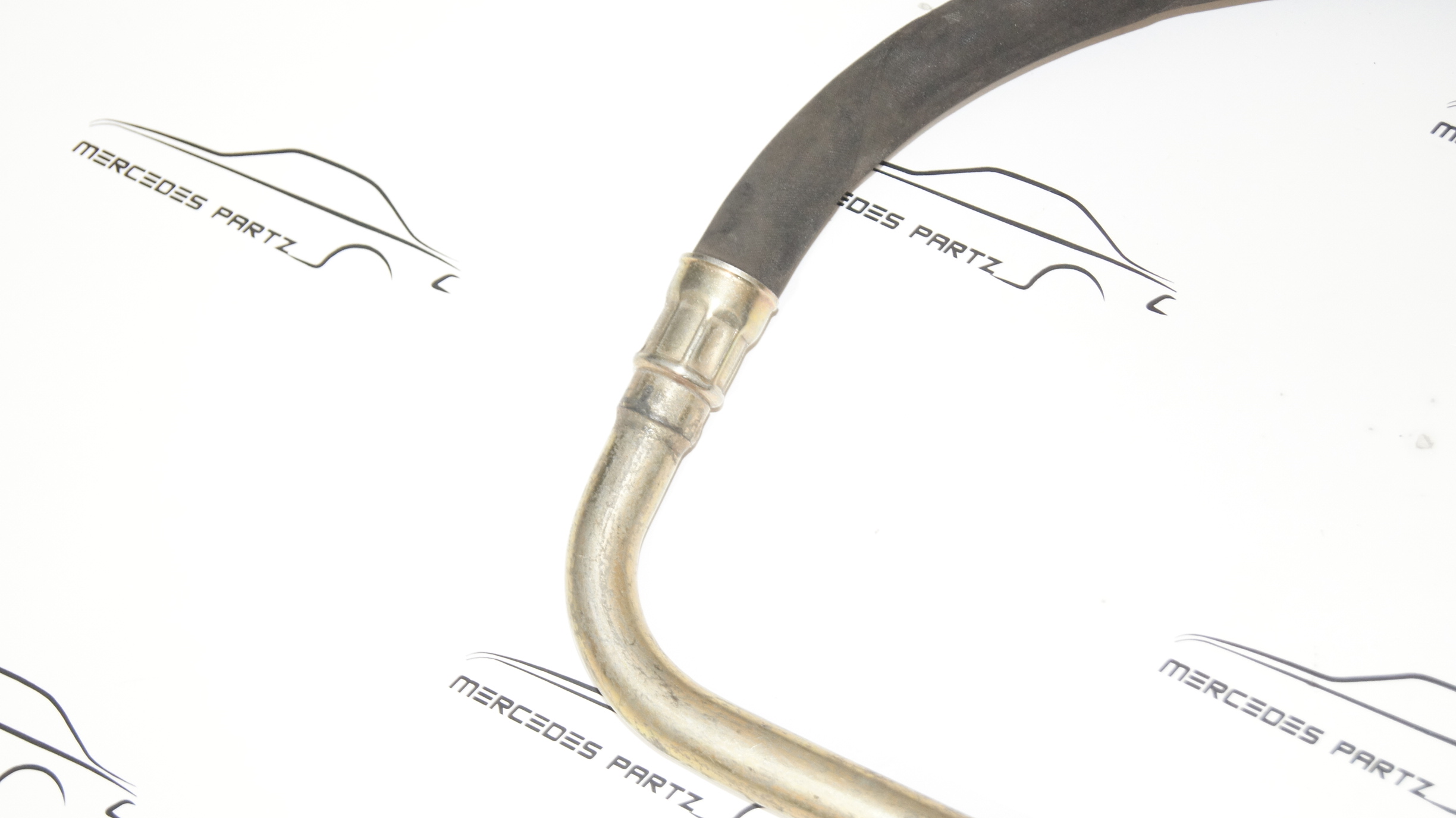 M110 oil cooler to oil filter hose A1101871482 Genuine Mercedes Part M110 oil cooler to oil filter hose A1101871482 Genuine Mercedes Part
