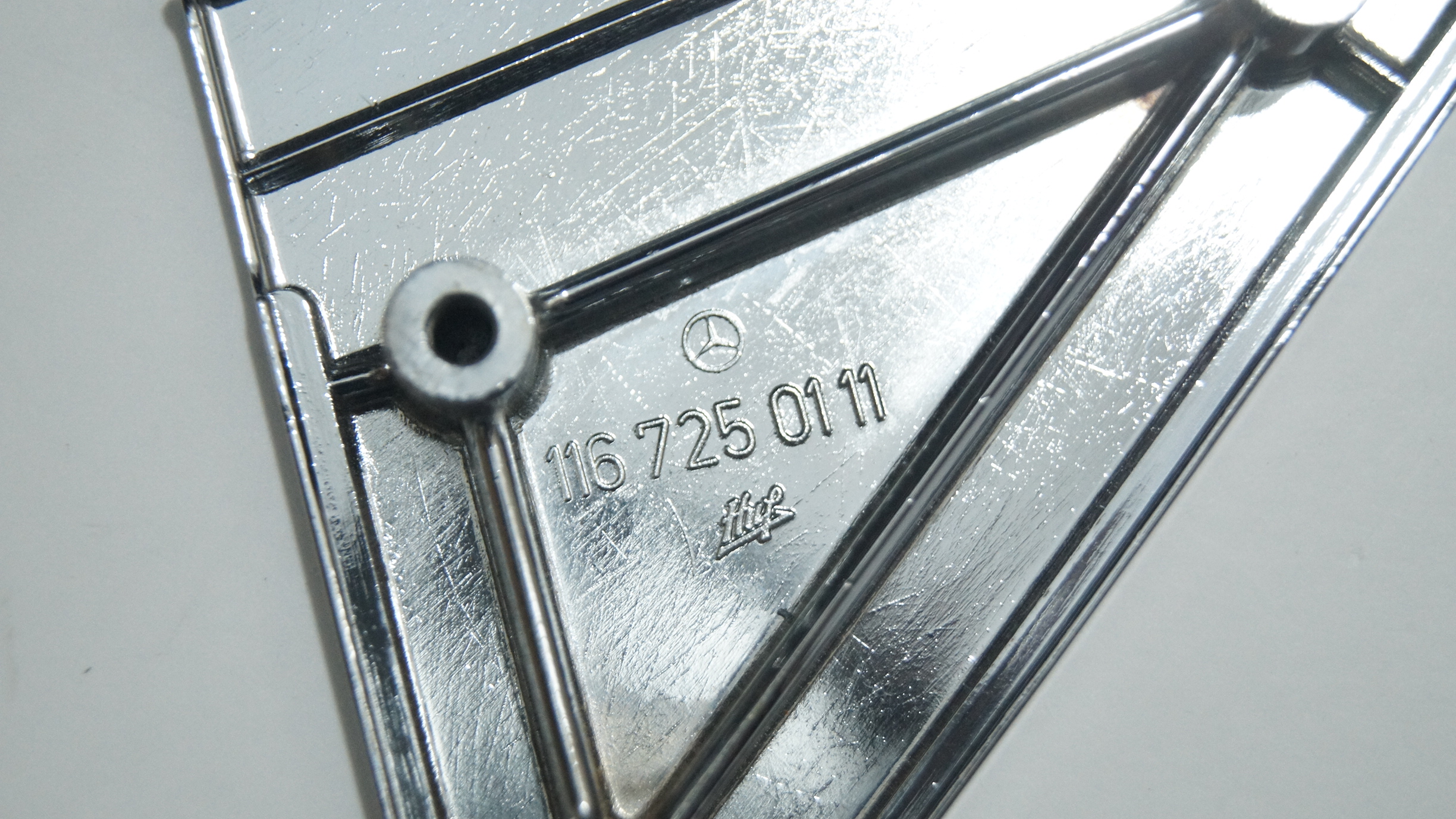 W116 outside left mirror plate Genuine Mercedes Part W116 outside left mirror plate Genuine Mercedes Part