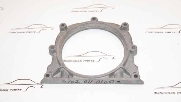 M102 crankshaft rear sealing cover Genuine Mercedes Part M102 crankshaft rear sealing cover Genuine Mercedes Part