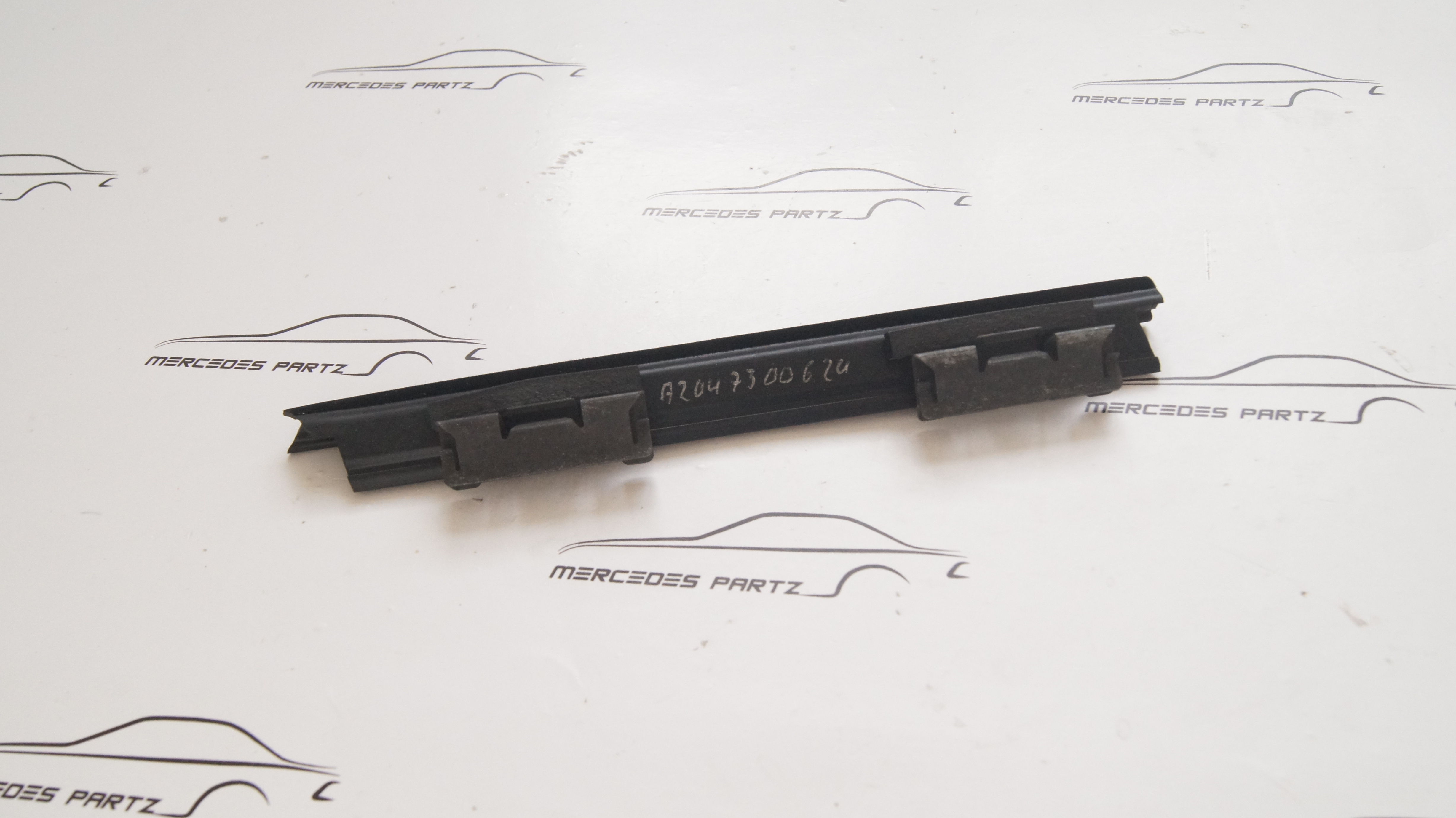 W204 rear right door inside window sliding rail Genuine Mercedes Part W204 rear right door inside window sliding rail Genuine Mercedes Part