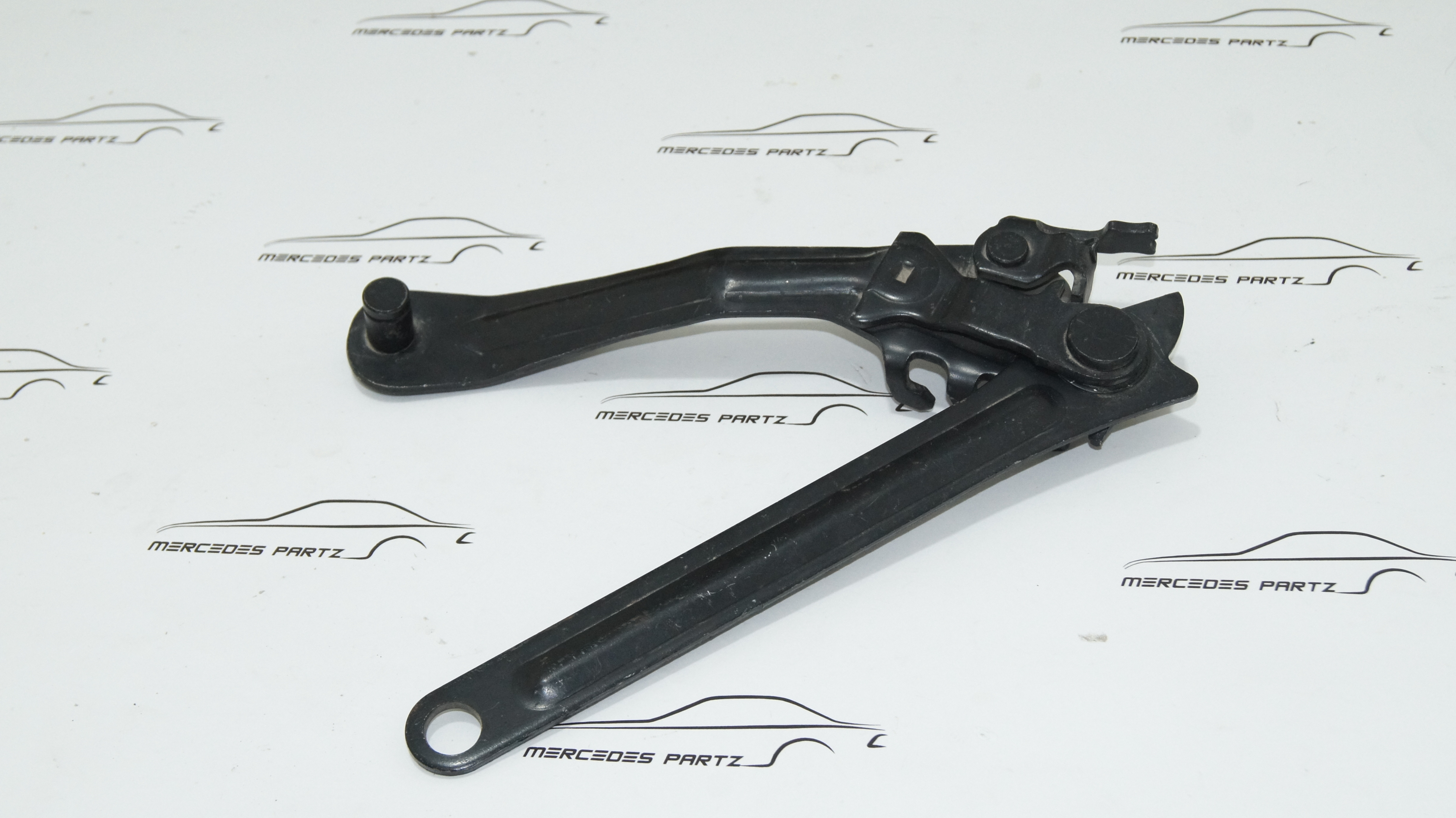 A1238800977 W123 hood left support hinge Genuine Mercedes Part A1238800977 W123 hood left support hinge Genuine Mercedes Part