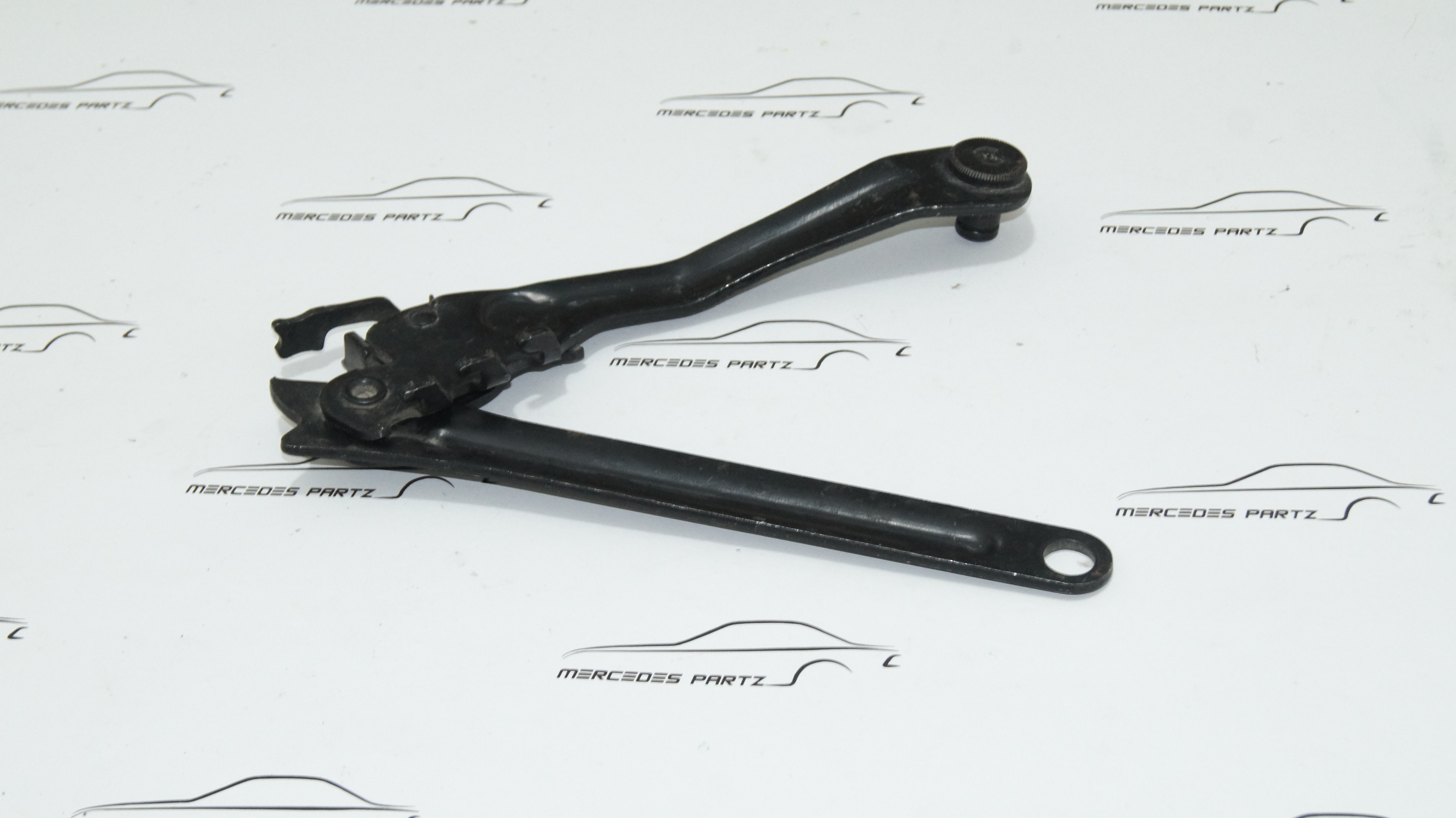 A1238800977 W123 hood left support hinge Genuine Mercedes Part A1238800977 W123 hood left support hinge Genuine Mercedes Part