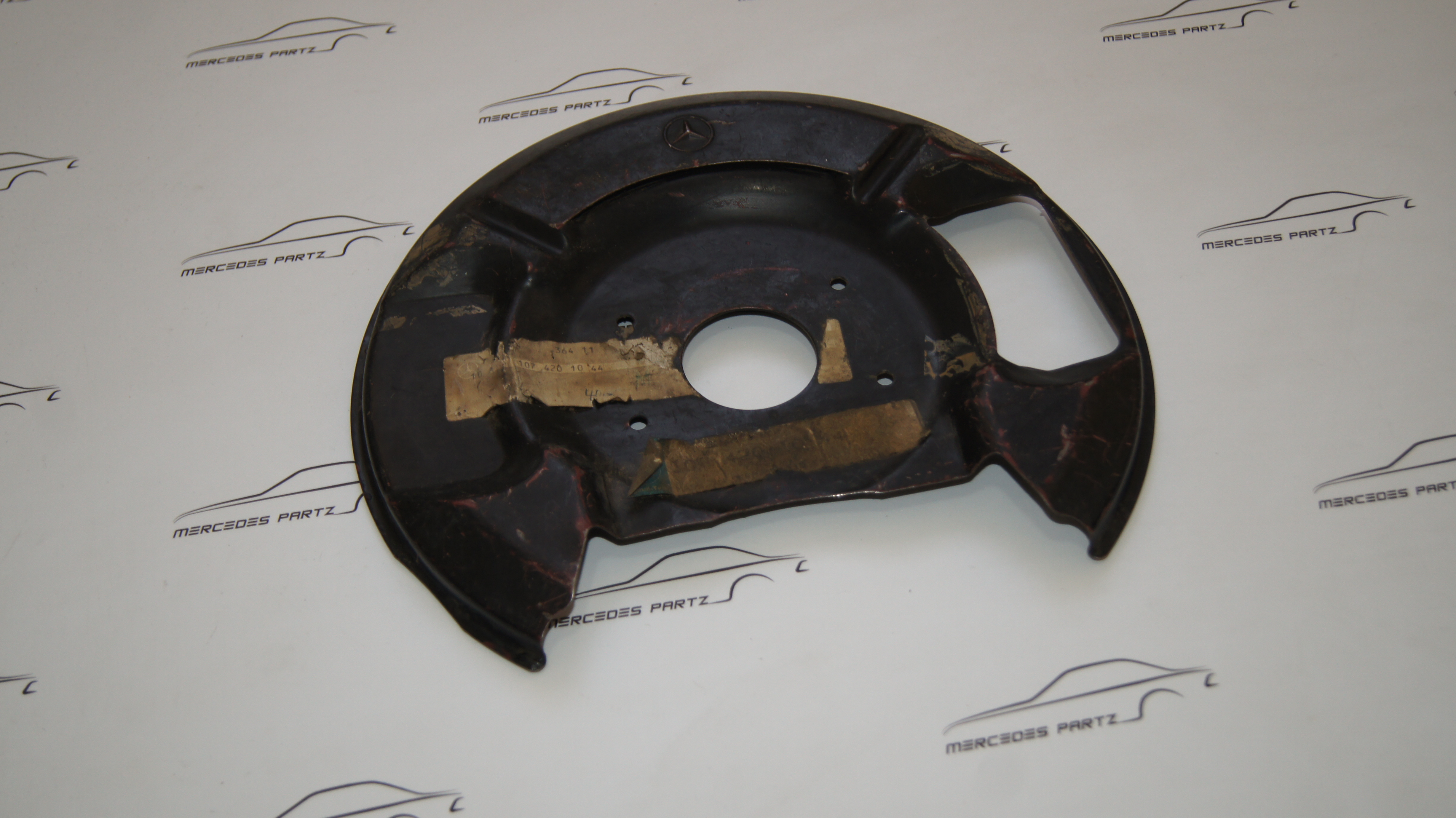 W107 front right protective plate NOS A1074201044 Genuine Mercedes Part W107 front right protective plate NOS A1074201044 Genuine Mercedes Part