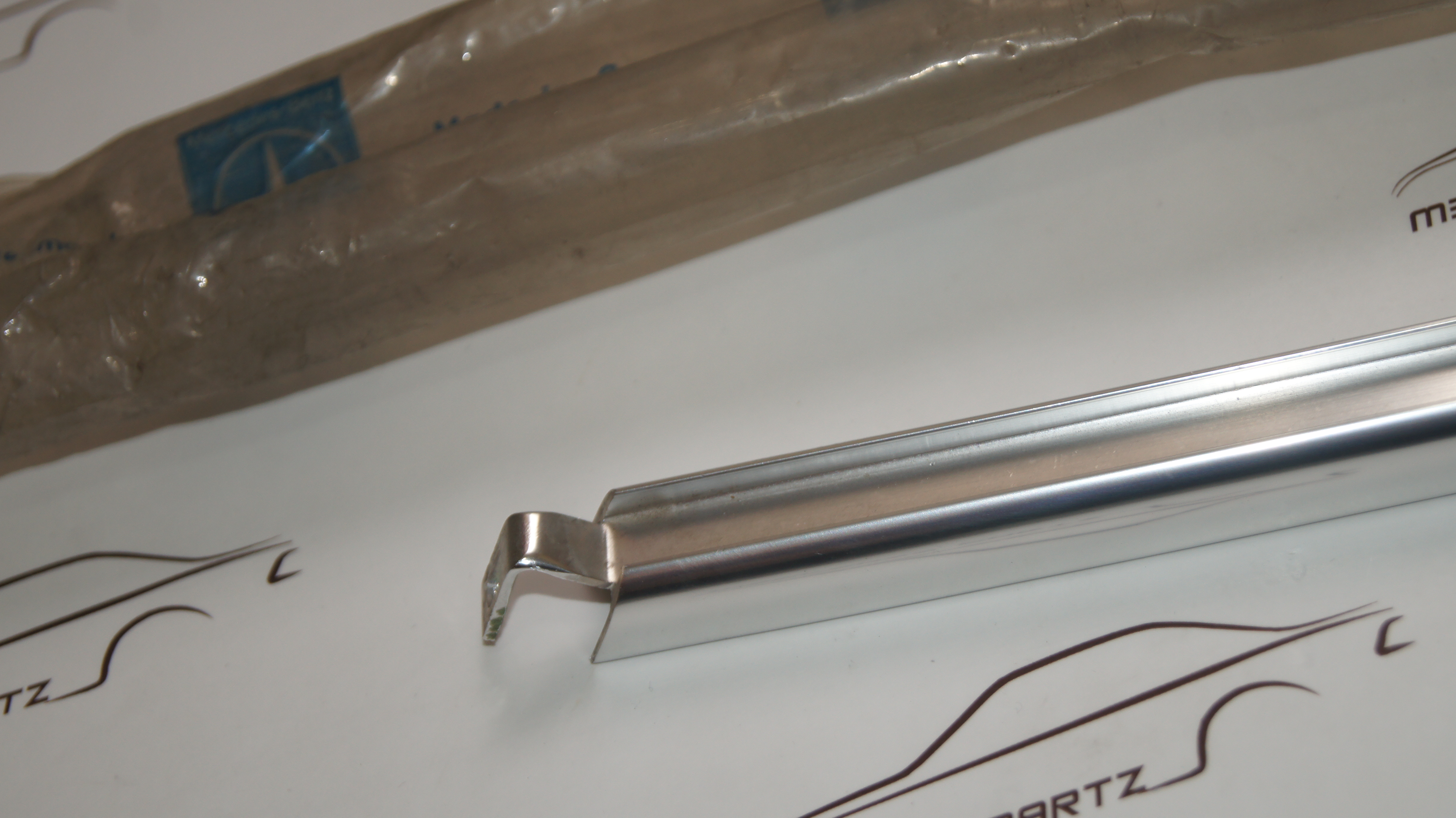 W114 W115 rear door window staybar left Genuine Mercedes Part W114 W115 rear door window staybar left Genuine Mercedes Part