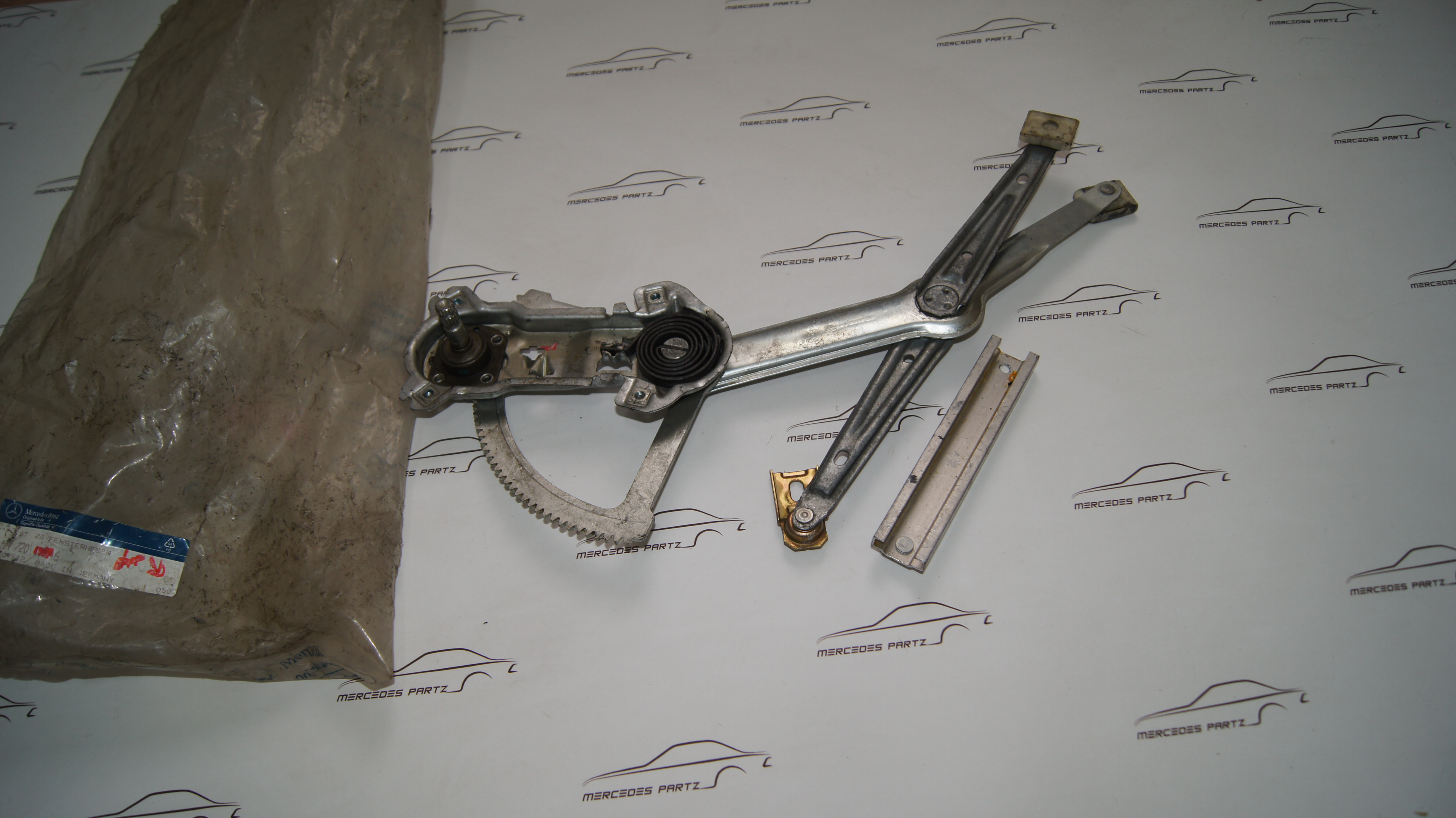 W124 front left window lift mechanism brose Genuine Mercedes Part W124 front left window lift mechanism brose Genuine Mercedes Part