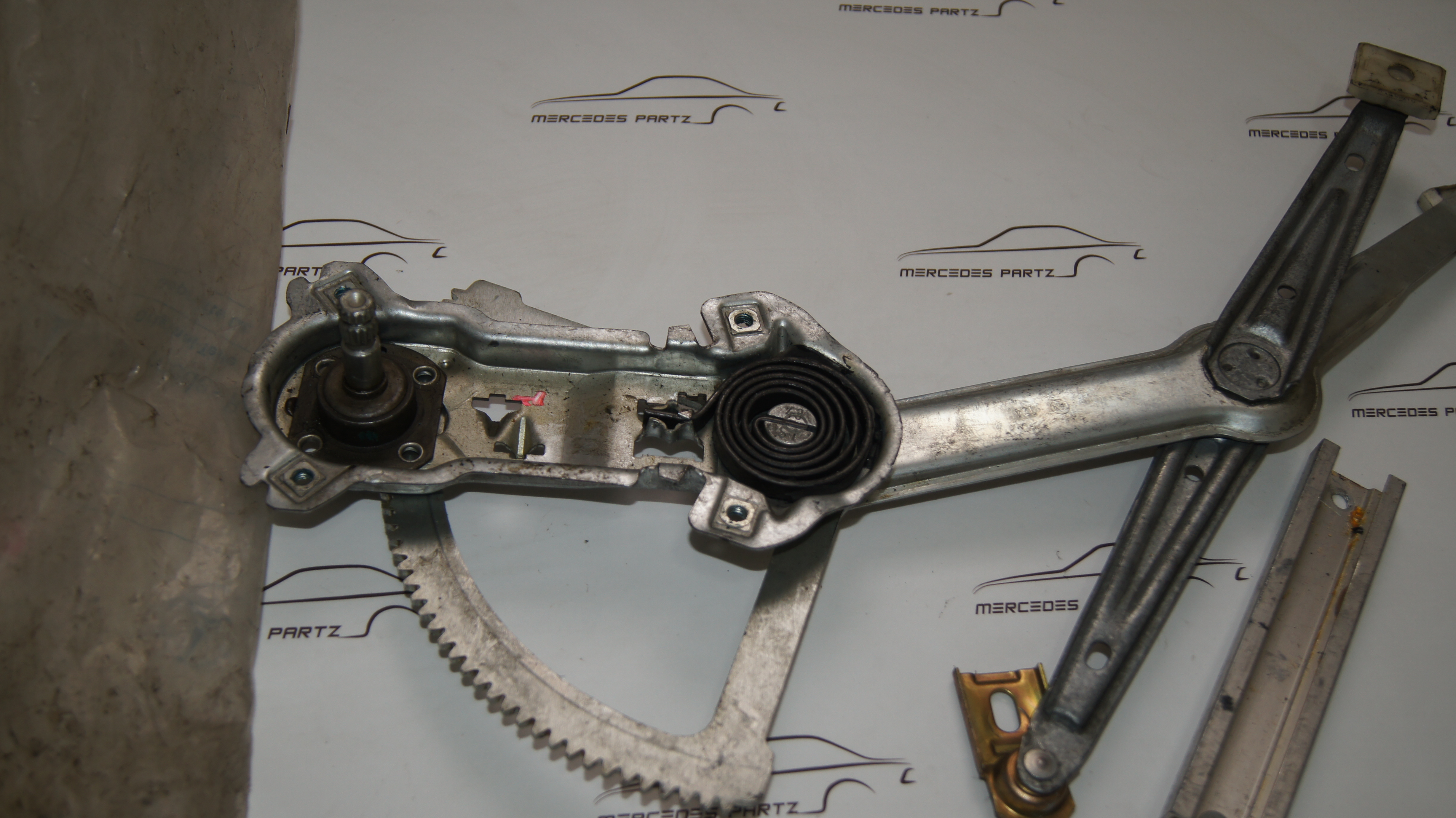 W124 front left window lift mechanism brose Genuine Mercedes Part W124 front left window lift mechanism brose Genuine Mercedes Part