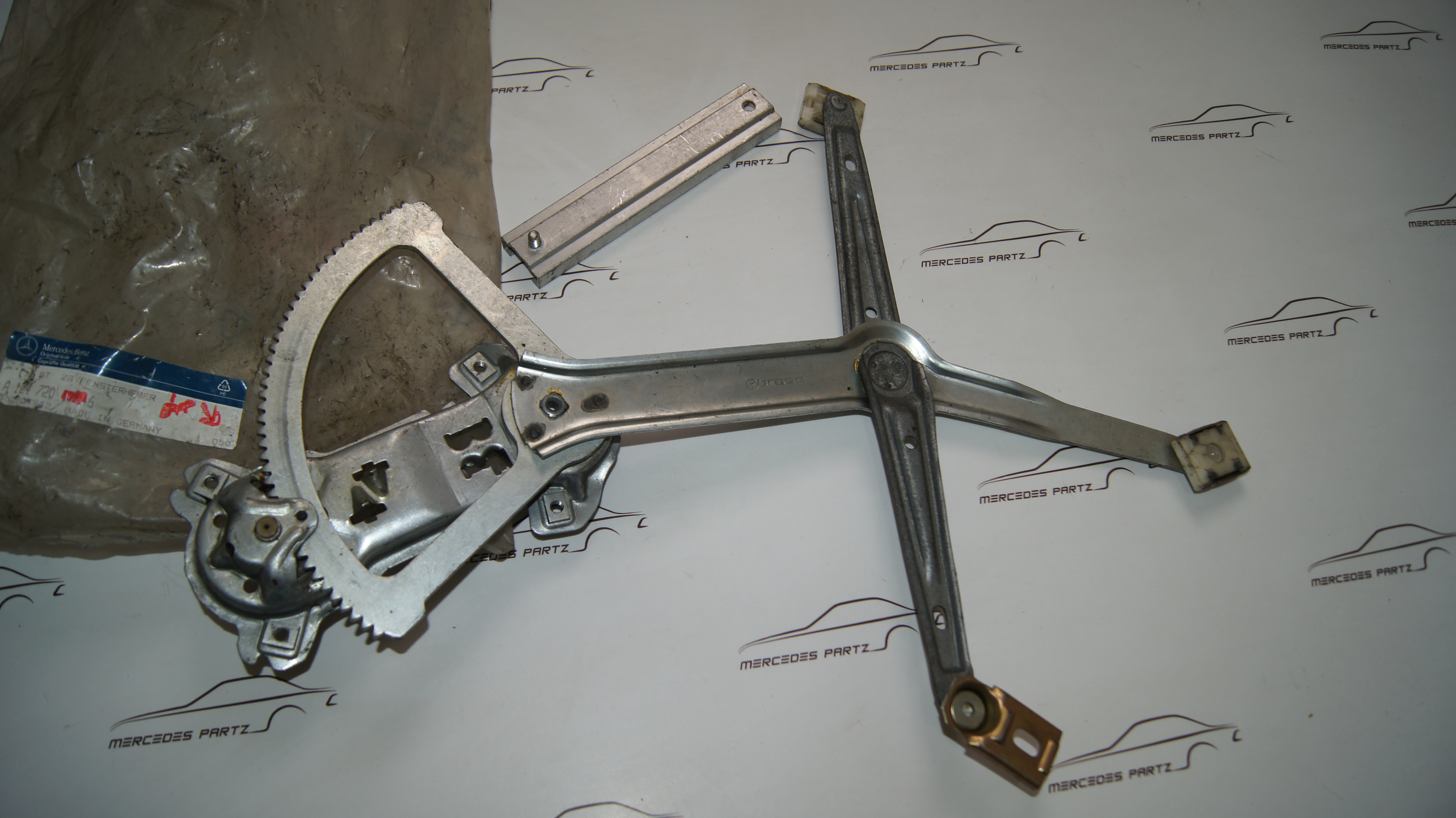 W124 front left window lift mechanism brose Genuine Mercedes Part W124 front left window lift mechanism brose Genuine Mercedes Part