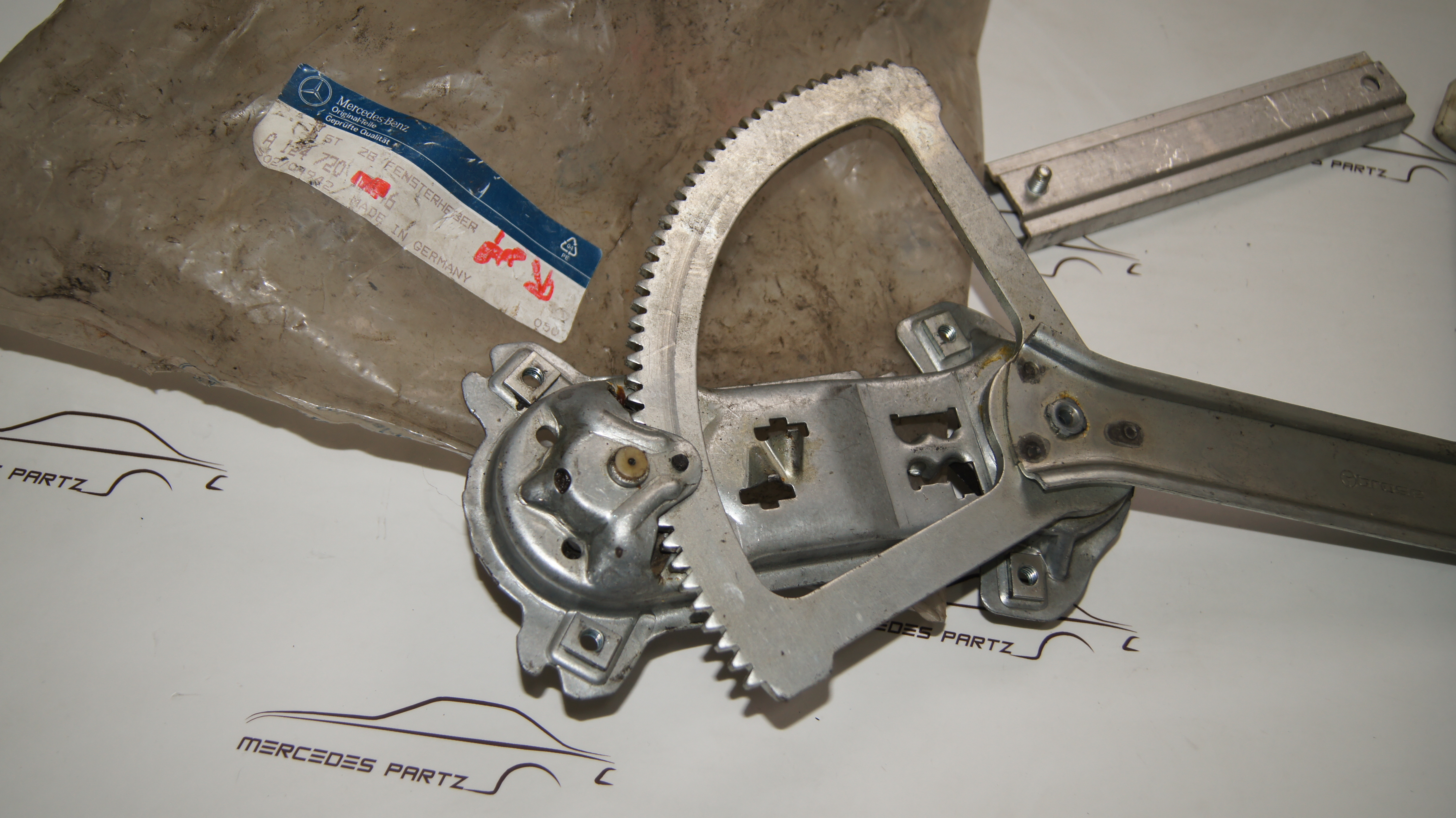 W124 front left window lift mechanism brose Genuine Mercedes Part W124 front left window lift mechanism brose Genuine Mercedes Part