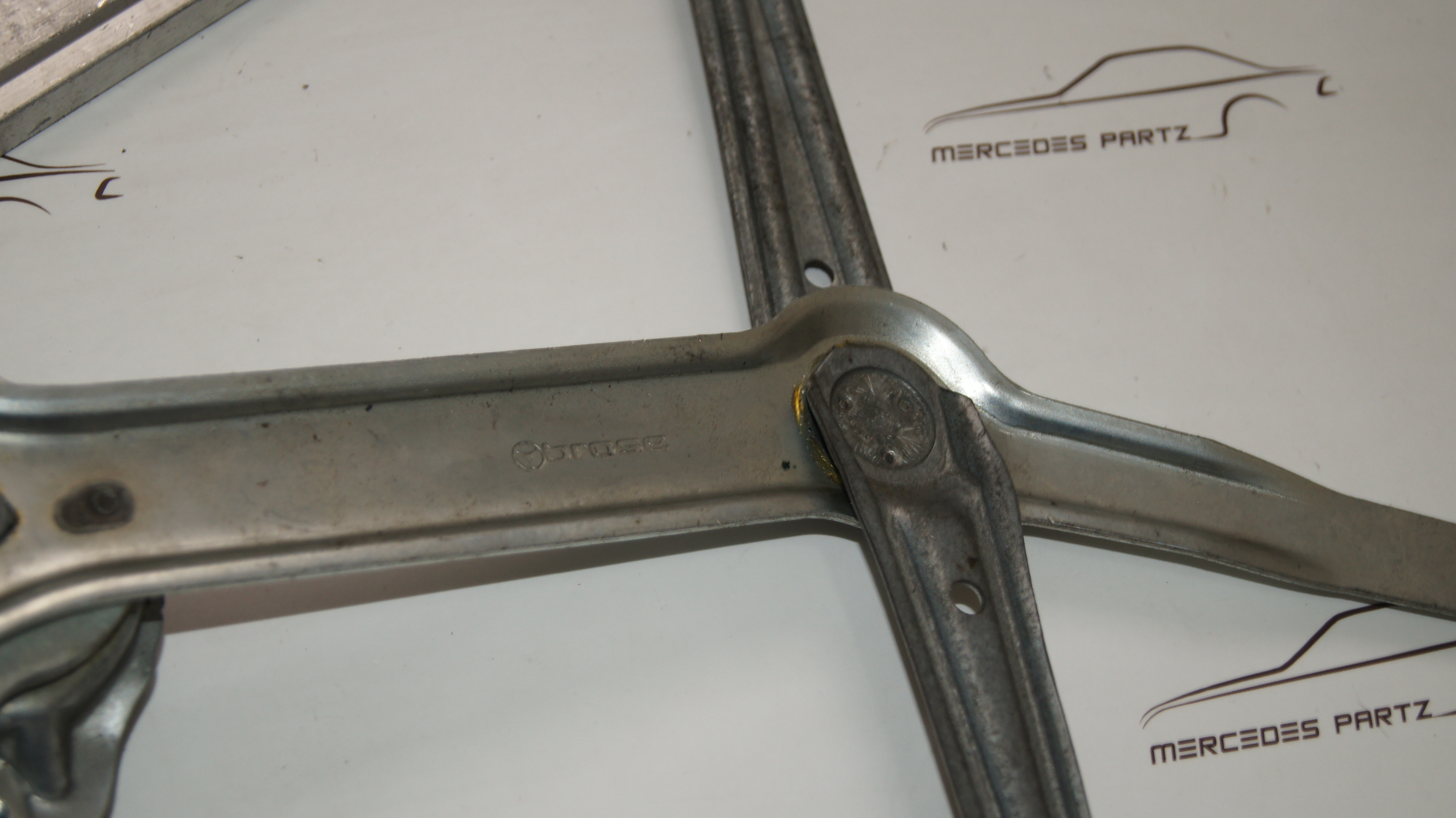 W124 front left window lift mechanism brose Genuine Mercedes Part W124 front left window lift mechanism brose Genuine Mercedes Part