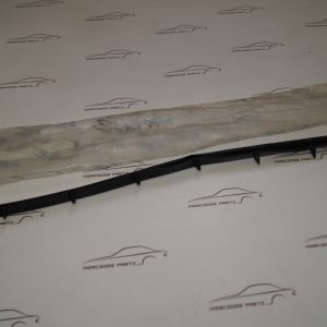 W124 rear bumper left side seal Genuine Mercedes Part