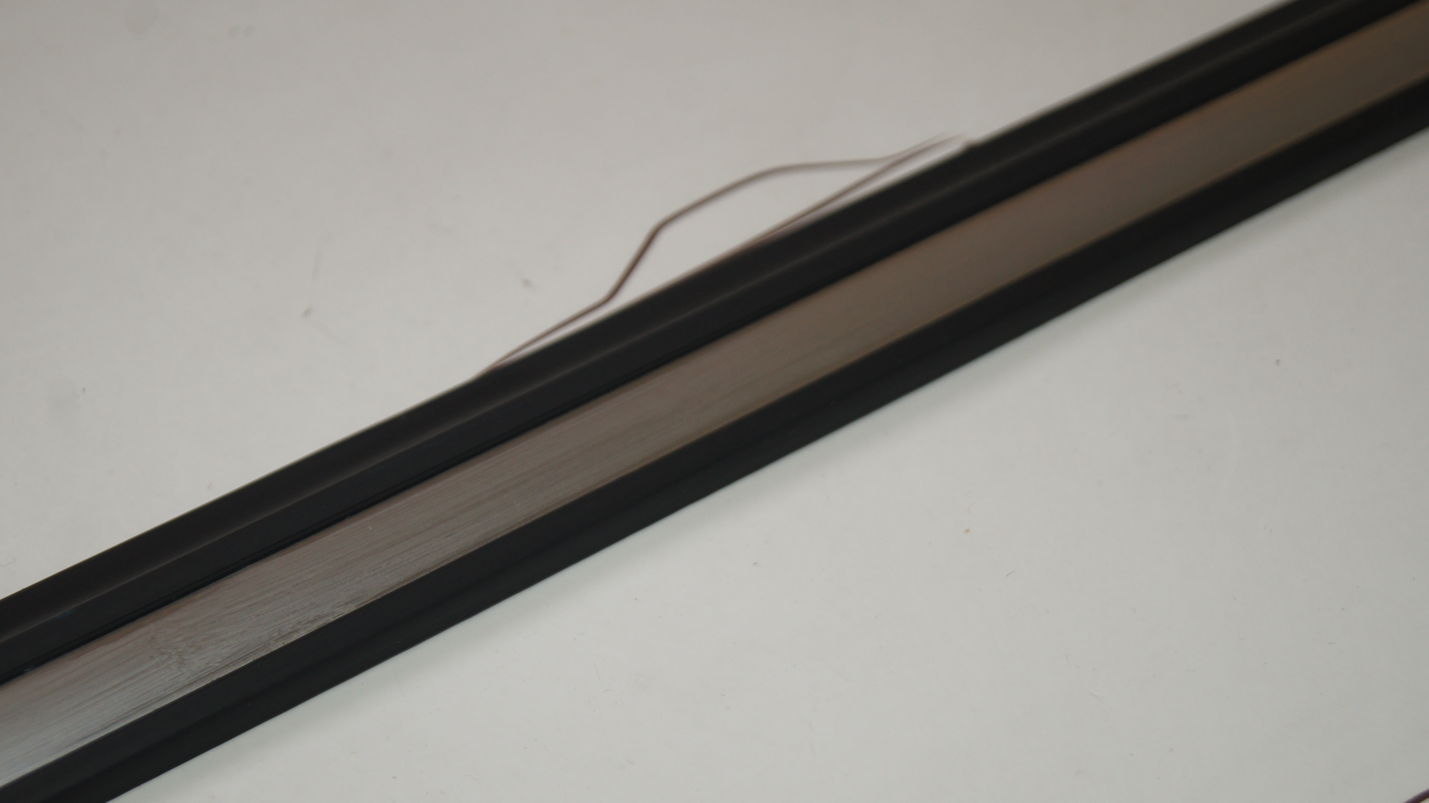 W123 front door bottom left garnish moulding Genuine Mercedes Part W123 front door bottom left garnish moulding Genuine Mercedes Part