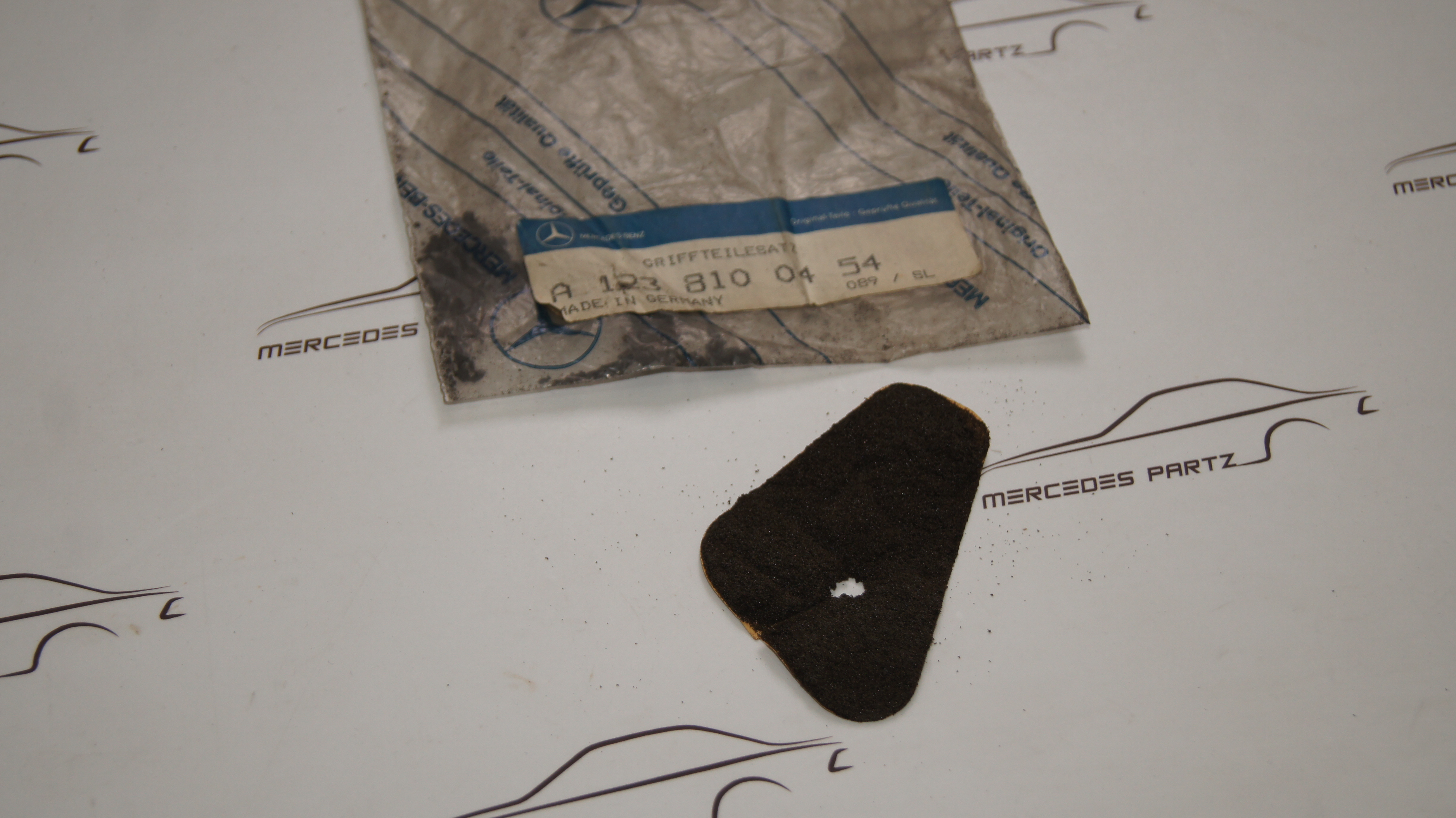 W123 left rear view mirror seal Genuine Mercedes Part W123 left rear view mirror seal Genuine Mercedes Part