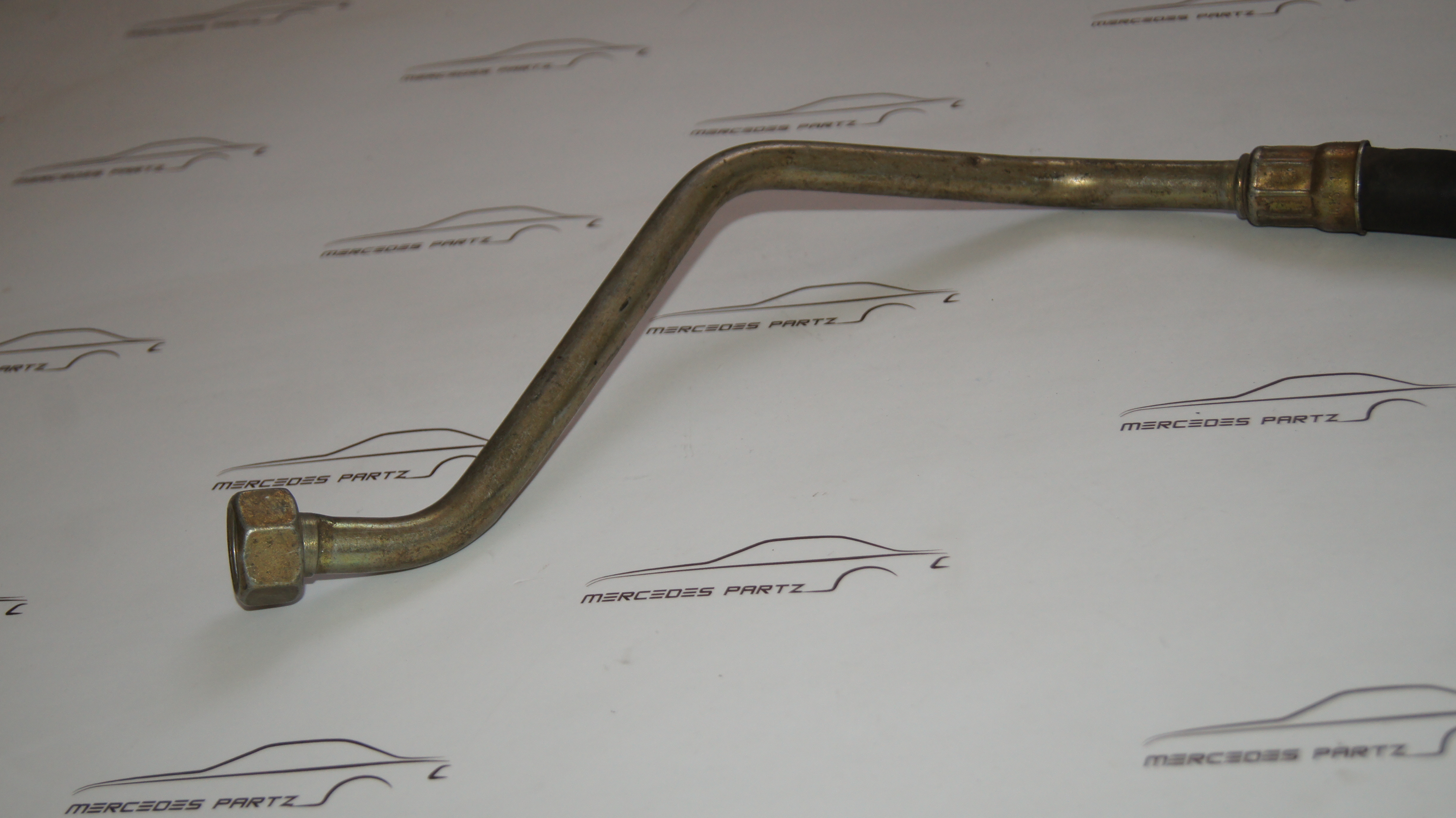 W123 240D OM616 912 oil cooler to filter top hose Genuine Mercedes Part W123 240D OM616 912 oil cooler to filter top hose Genuine Mercedes Part