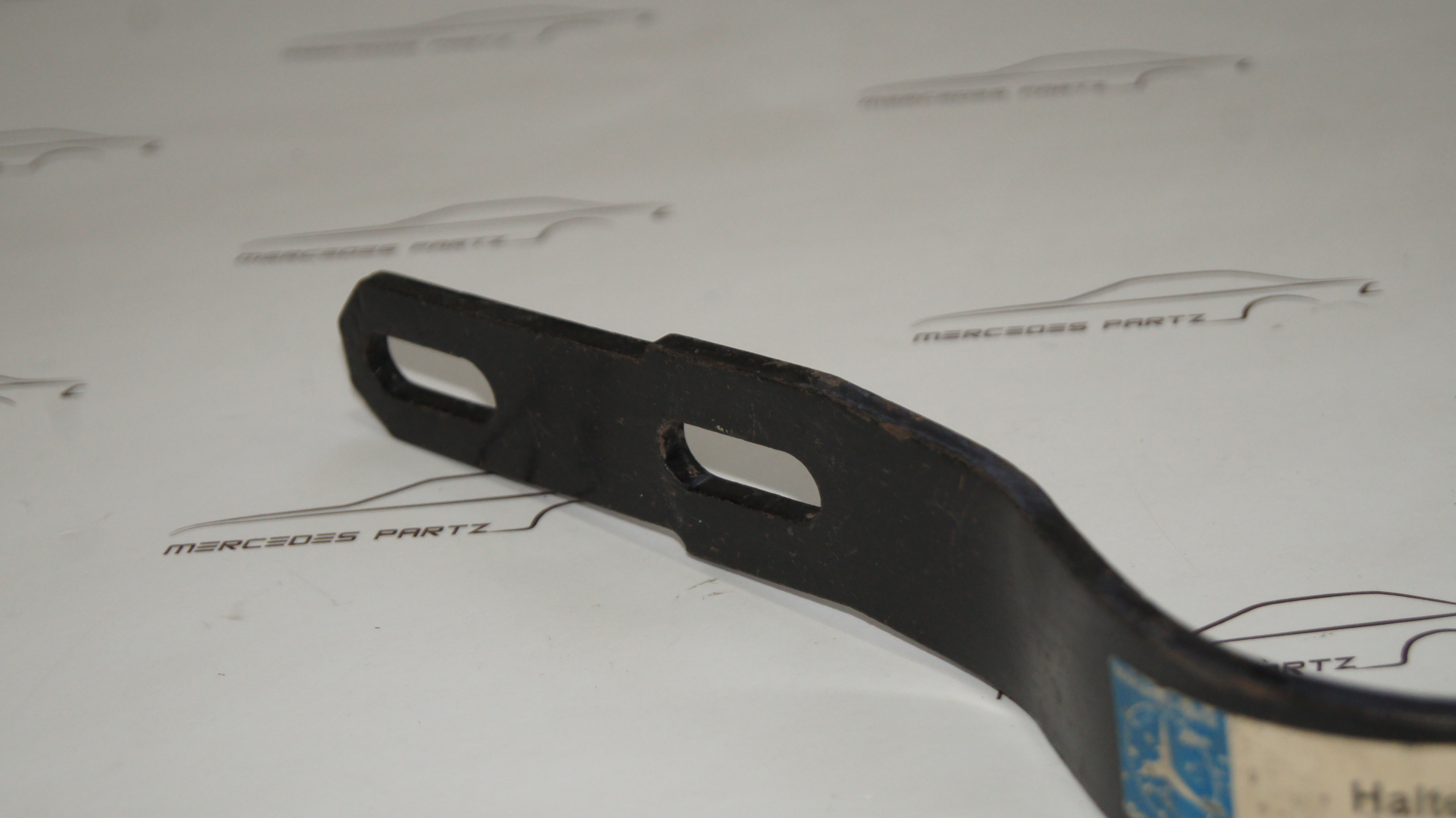 W116 Front right bumper bracket Genuine Mercedes Part W116 Front right bumper bracket Genuine Mercedes Part