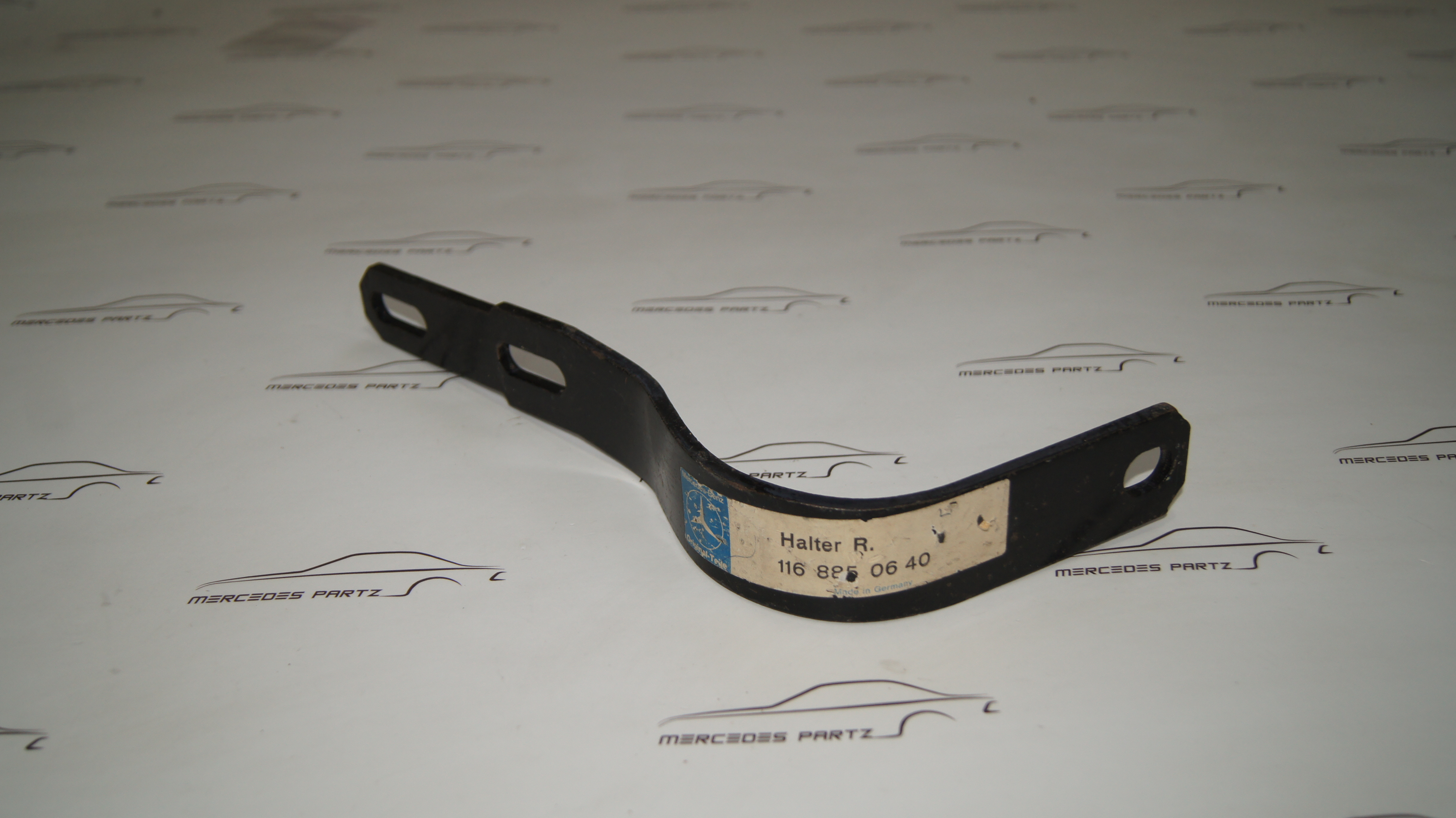 W116 Front right bumper bracket Genuine Mercedes Part W116 Front right bumper bracket Genuine Mercedes Part