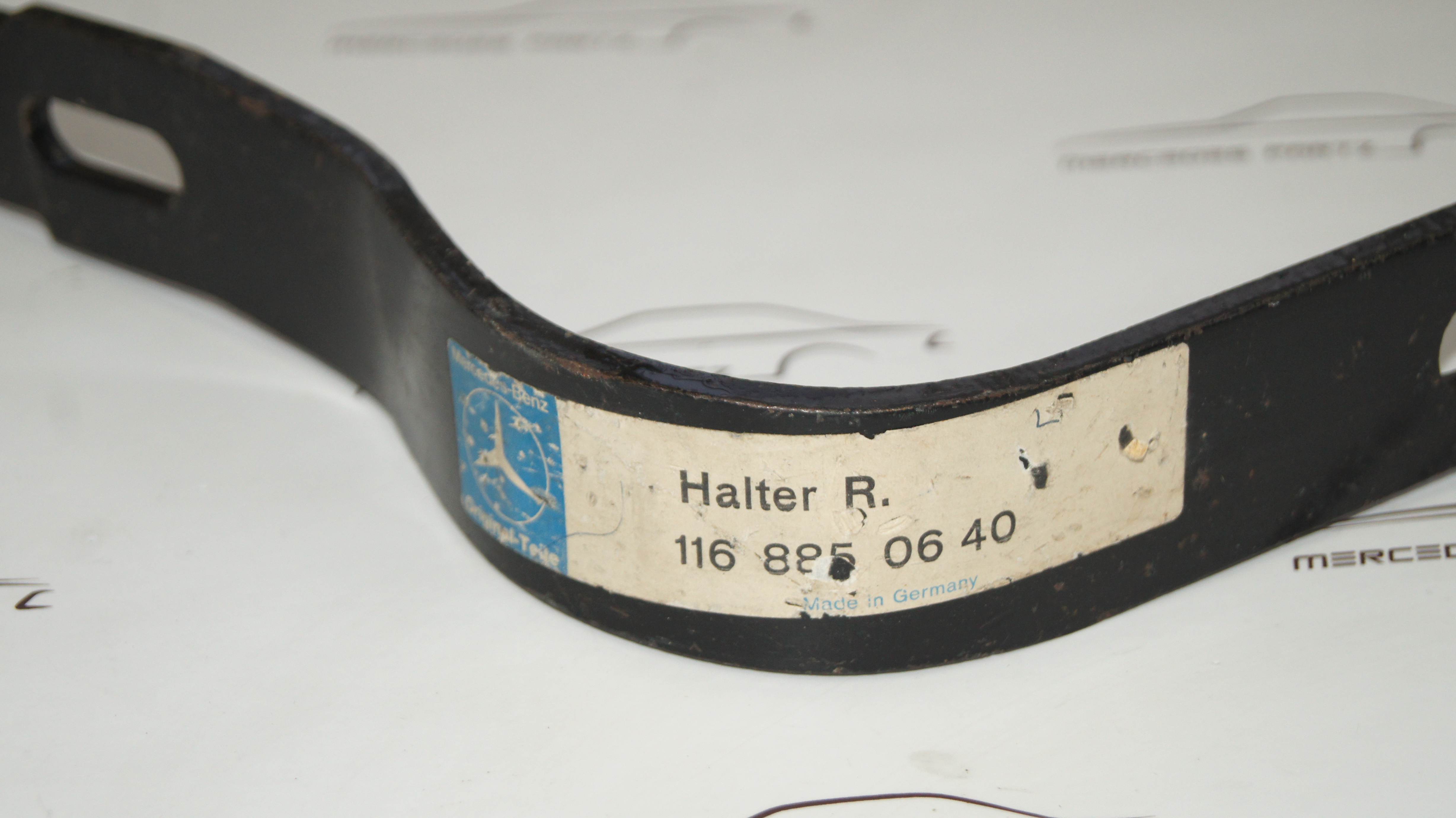 W116 Front right bumper bracket Genuine Mercedes Part W116 Front right bumper bracket Genuine Mercedes Part