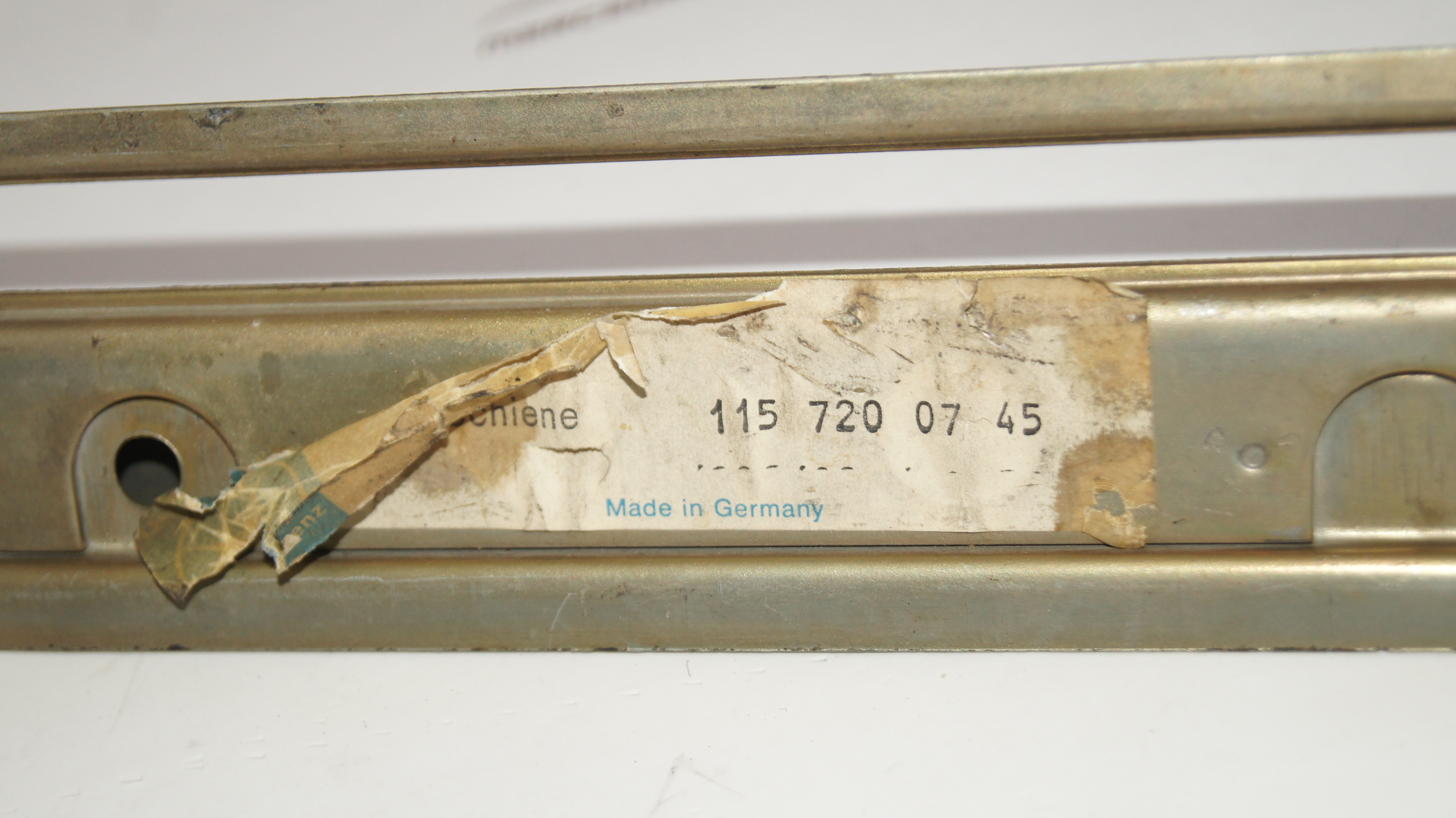 W114 W115 front left door window regulator rail Genuine Mercedes Part W114 W115 front left door window regulator rail Genuine Mercedes Part