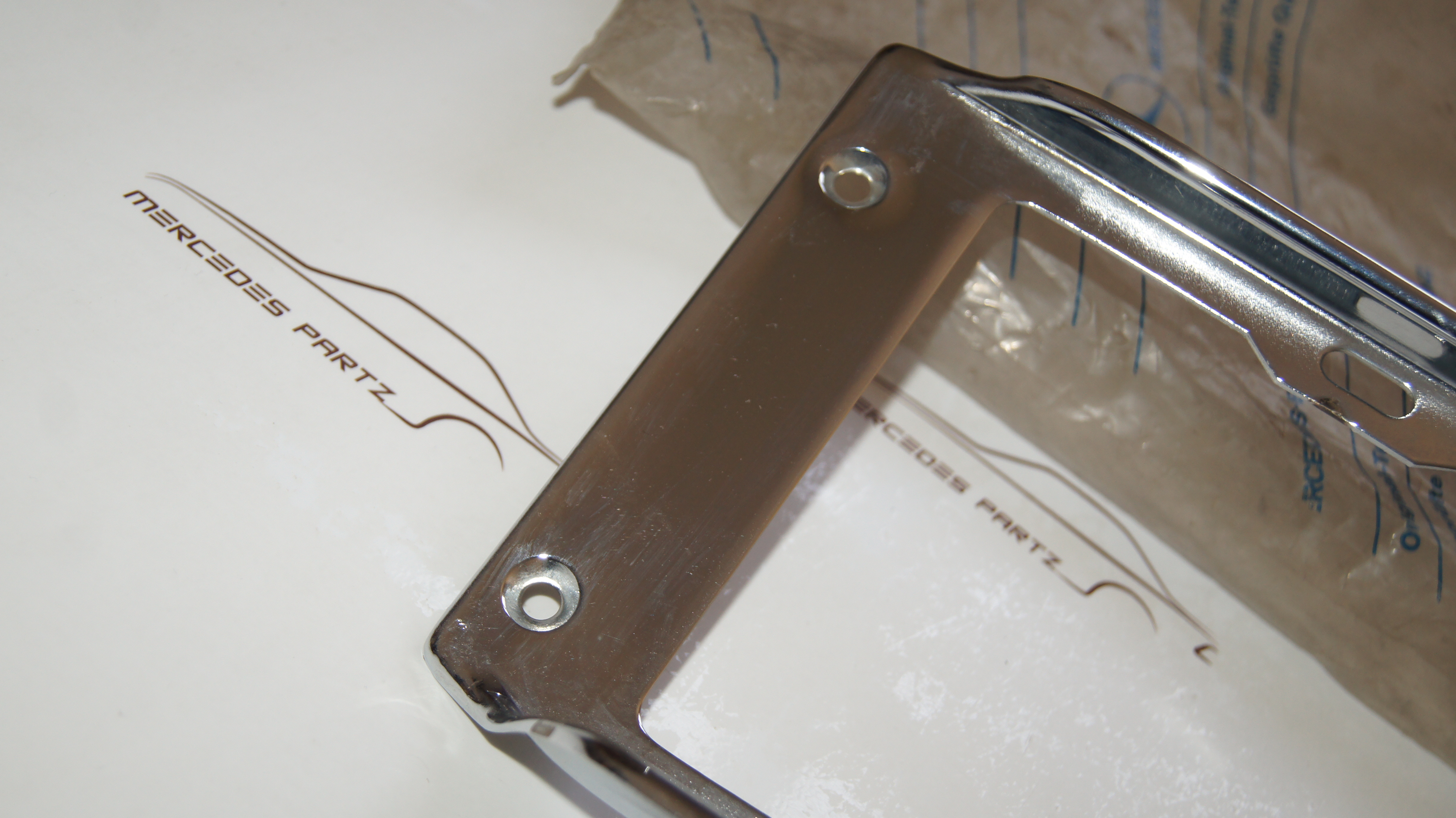 O303 bus rear left taillight chrome rim Genuine Mercedes Part O303 bus rear left taillight chrome rim Genuine Mercedes Part