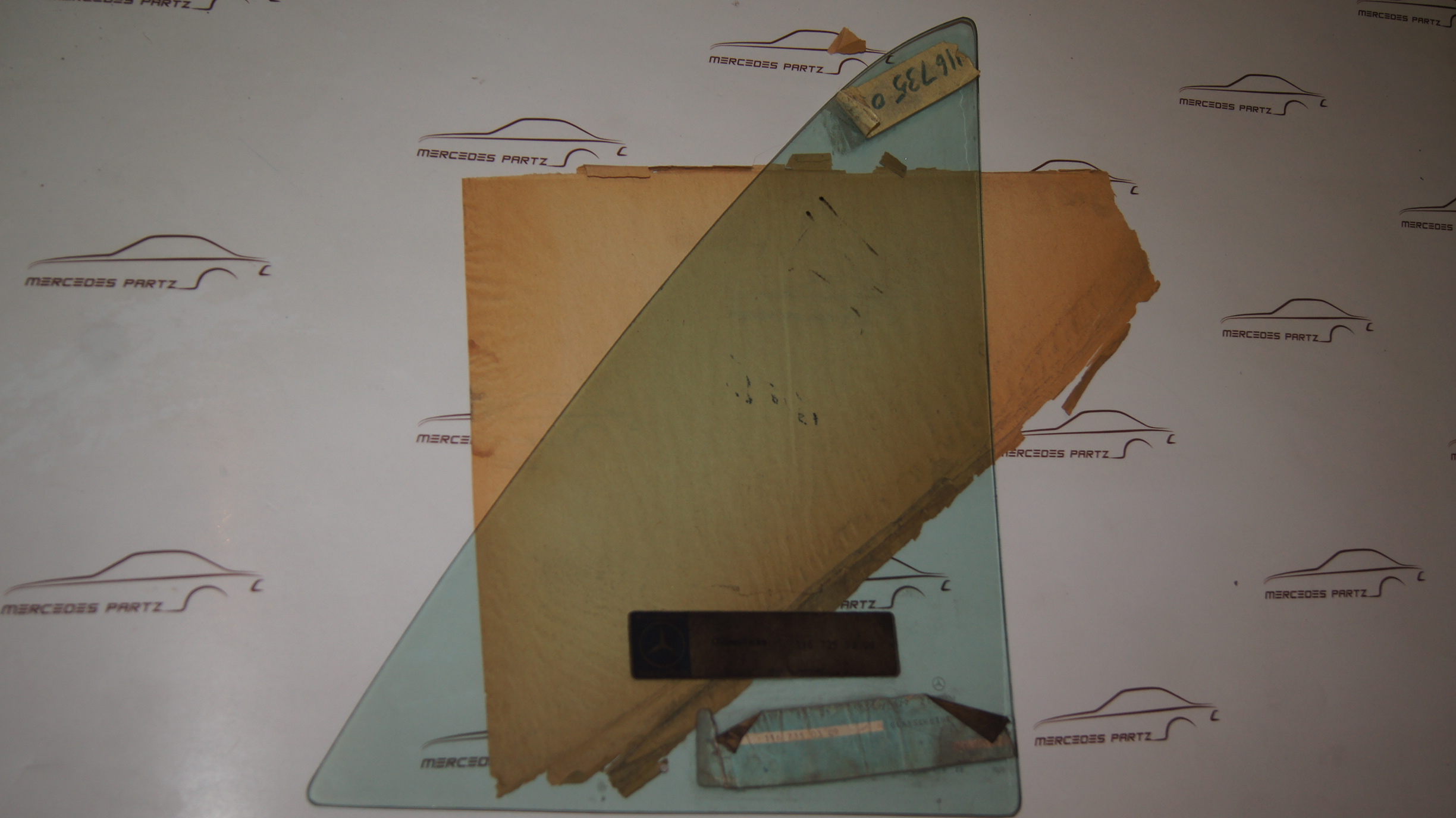 W116 heat absorbing rear left glass pane Genuine Mercedes Part W116 heat absorbing rear left glass pane Genuine Mercedes Part