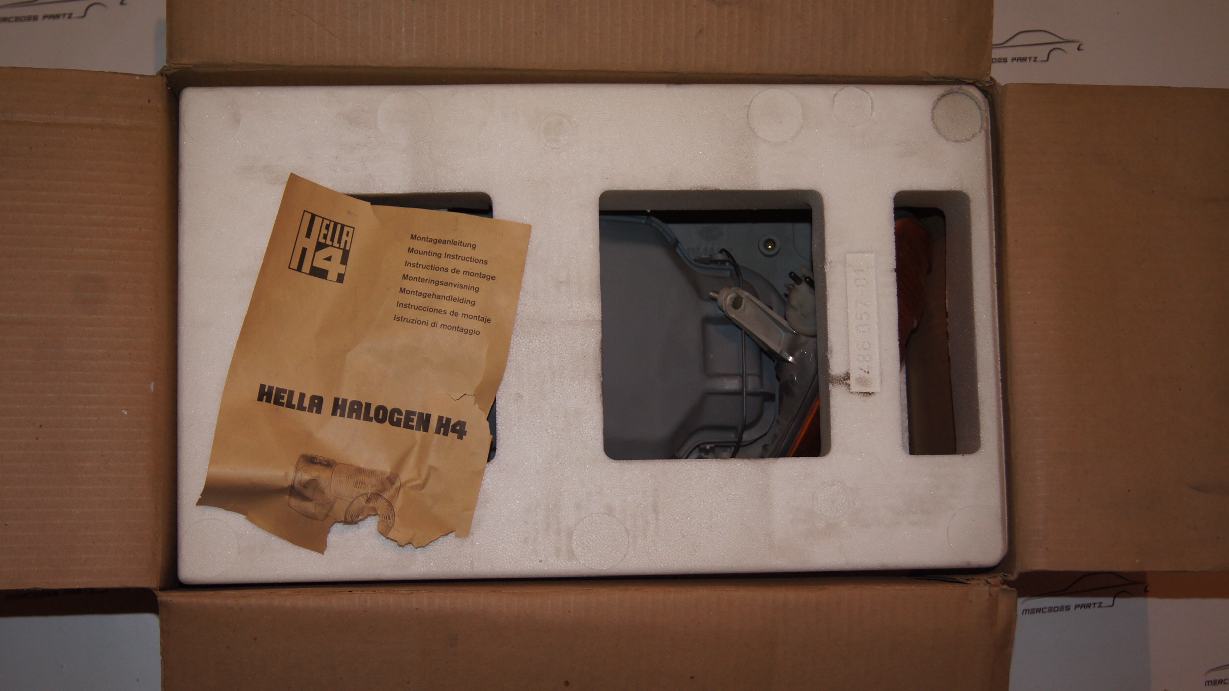 W123 Hella left headlight with side marker A1238204161 Genuine Mercedes Part W123 Hella left headlight with side marker A1238204161 Genuine Mercedes Part