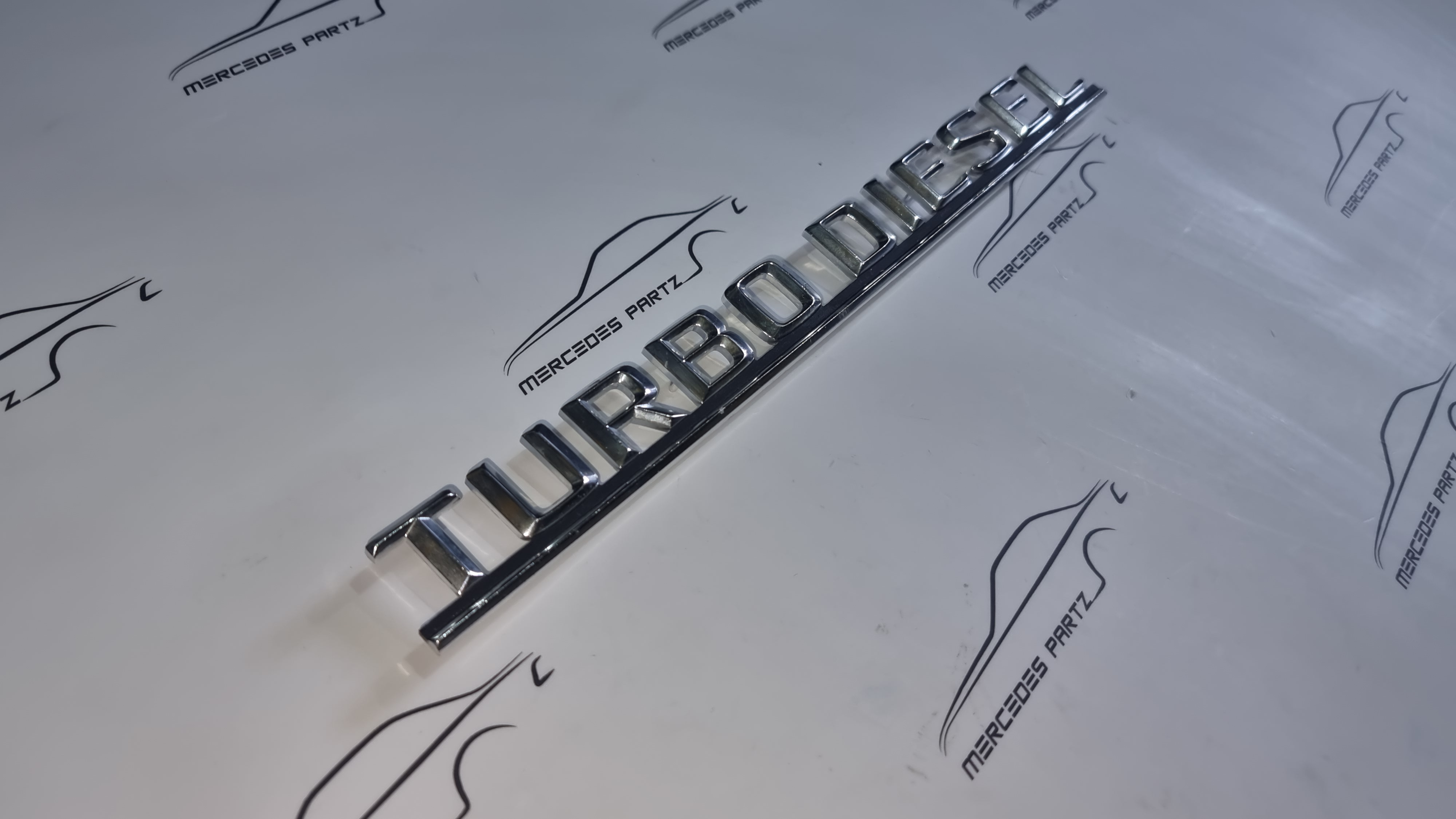 W126 Turbo diesel trunk type designation emblem NOS Genuine Mercedes Part W126 Turbo diesel trunk type designation emblem NOS Genuine Mercedes Part