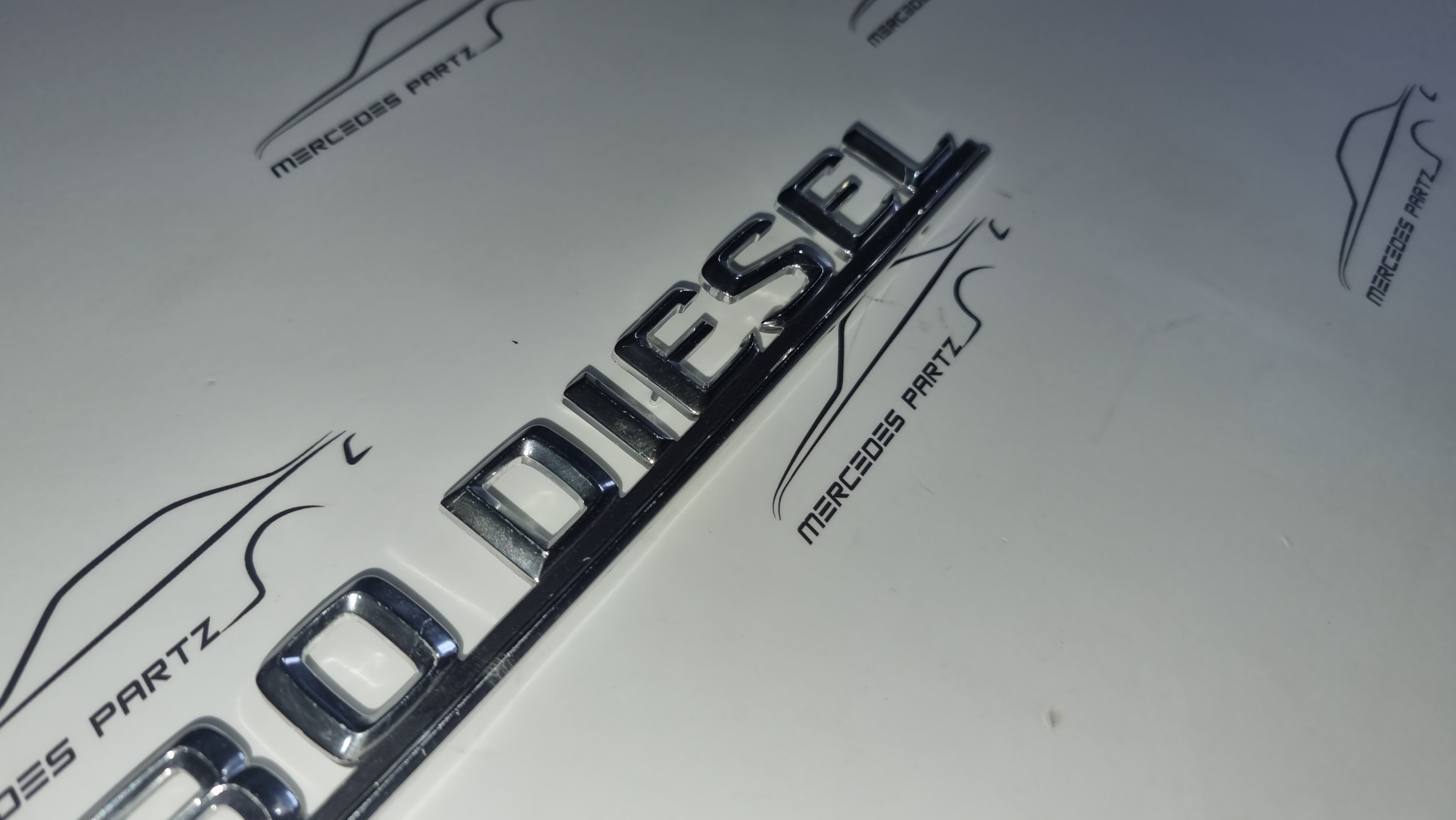 W126 Turbo diesel trunk type designation emblem NOS Genuine Mercedes Part W126 Turbo diesel trunk type designation emblem NOS Genuine Mercedes Part