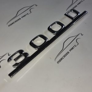 W123 300D trunk type designation emblem NOS A1238170915 Genuine Mercedes Part