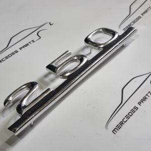 W123 250 trunk type designation emblem NOS A1238170615 Genuine Mercedes Part