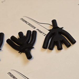 W124 air conditioner and adjustable headrest vacuum distributor NEW GENUINE Genuine Mercedes Part