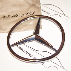 R107 rear trunk lid star NEW NOS A1077580458 Genuine Mercedes Part