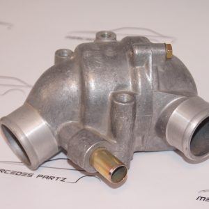 M110 thermostat housing with thermostat NEW NOS A1102030574 Genuine Mercedes Part