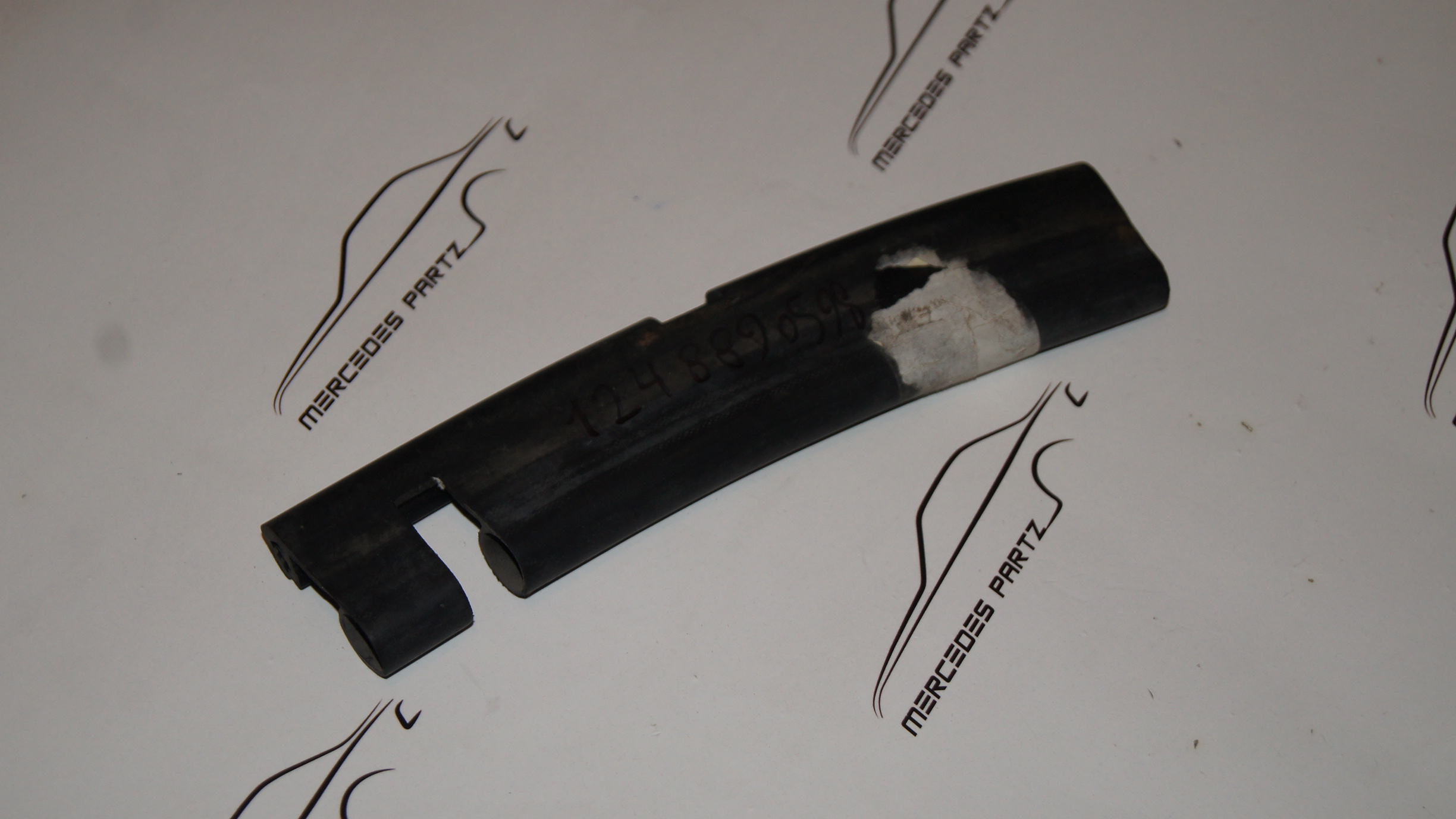 W124 engine hood front central seal Genuine Mercedes Part W124 engine hood front central seal Genuine Mercedes Part